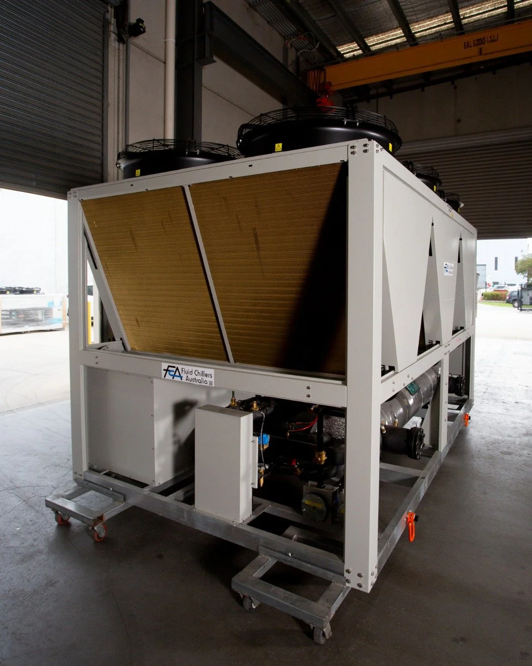 Big units. Big capacity.
 
Good thing we have a big roller door to get them out

The AC Series is designed for demanding industrial and commercial applications.  These air-cooled chillers balance performance with practical, service-friendly design, s