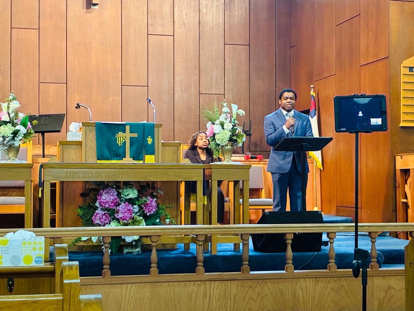 Bro. Trevor leading the service .jpg