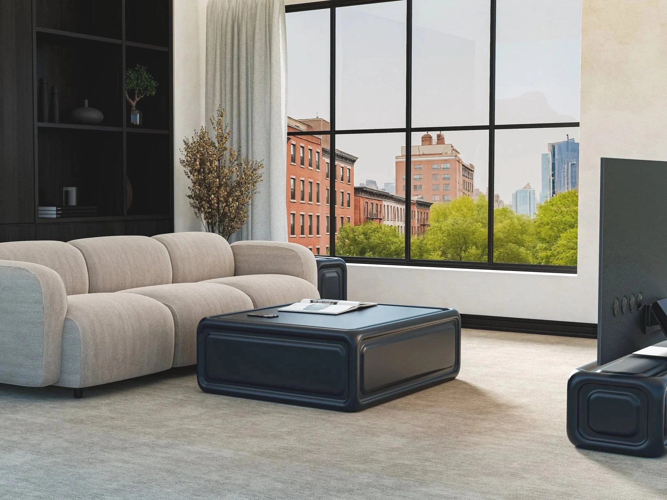 Modern living room with beige sofa, large window with cityscape and trees, black coffee table with magazines, and a TV