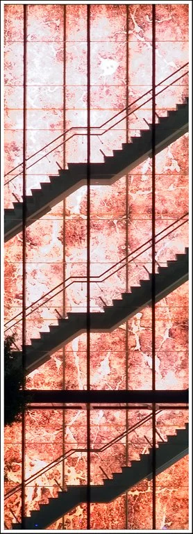 Pink terracotta staircase building exterior — register your interest with eSquared