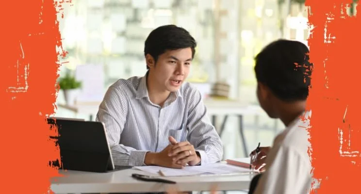 ADHD-ish blog, Two people having business meeting with laptop at table, Discovery Calls vs Free Consultation: What you need to know, free consultation call