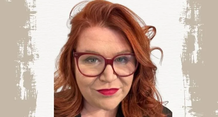 ADHD-ish blog, Sarah Dowd with red hair and burgundy glasses smiling, Stop Idea Overwhelm in Your Neurodivergent Small Businesses, neurodivergent small business, serial entrepreneurship, idea vetting process
