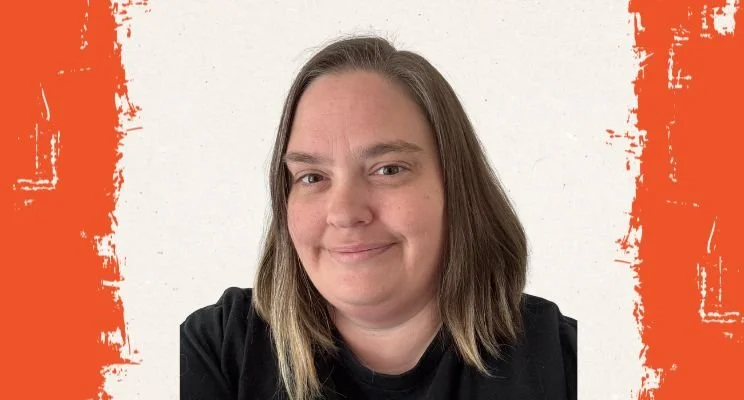 ADHD-ish blog, Smiling Steph poses against a simple background, Redefining Success After Loss: ADHD-Informed Support for Small Business Owner Burnout, business strategist coach, small business owner burnout, setting boundaries work