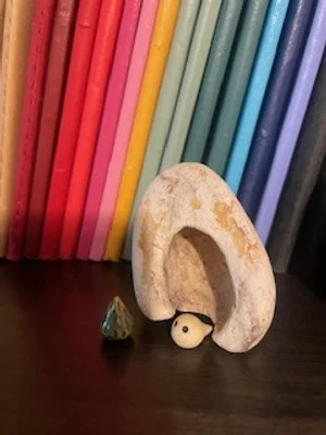 miniature pine tree and whimsical creature