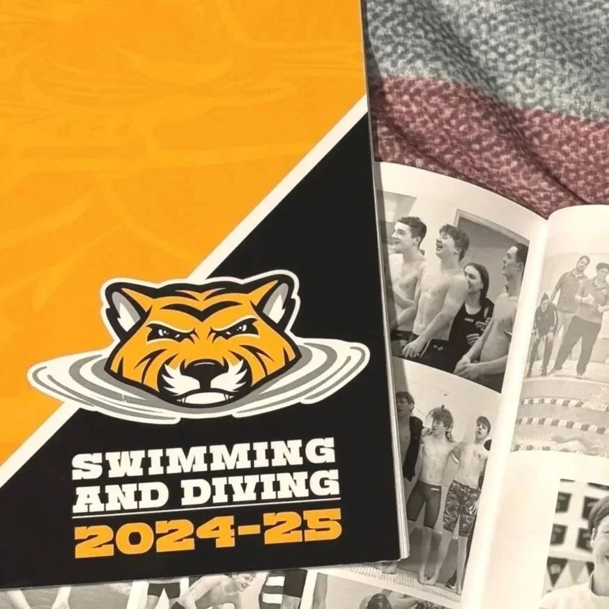 Swim Tiger logo on NAS yearbook cover