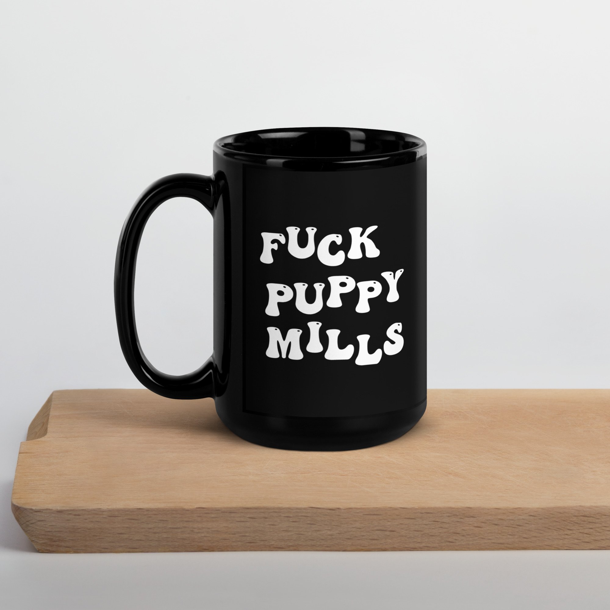 black-glossy-mug-black-15-oz-handle-on-left-65c28b4c4a85c.jpg