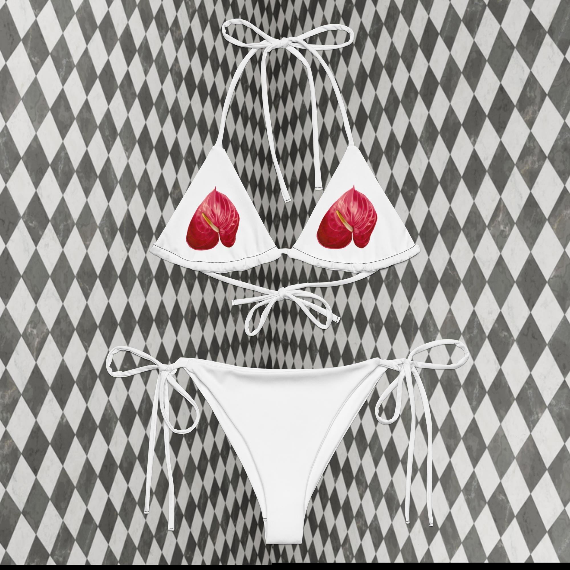 all-over-print-recycled-string-bikini-white-front-6686291cac018.jpg