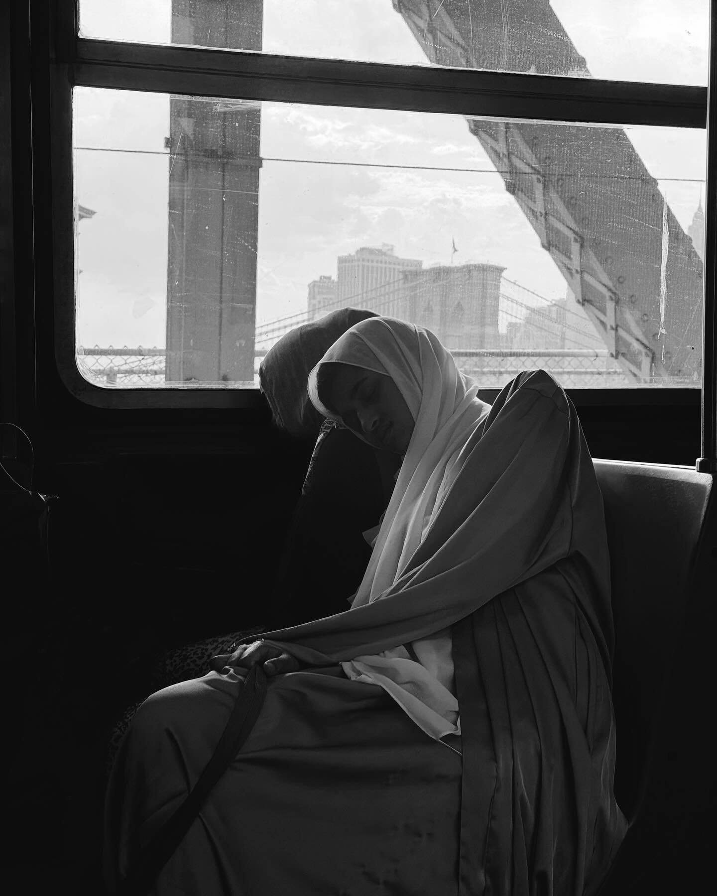 Snapped these on my commute back home just on my iPhone&hellip;something about these just kept me captive of the moment 🖤 

#bnwphotography #nycliving #sisterlove #nycphotographer #nyccommute #subwayphotography #shotoniphone