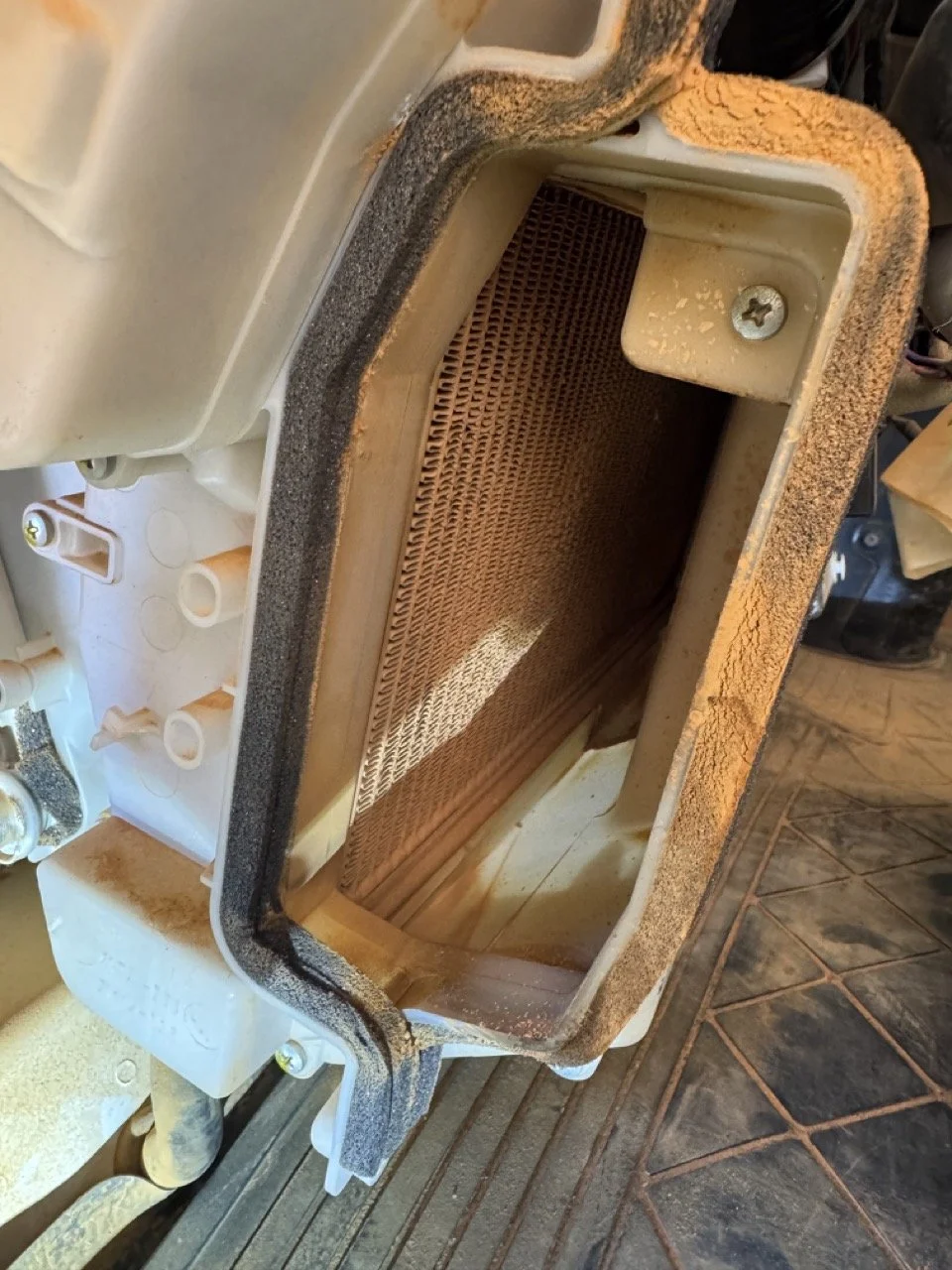 Isuzu NNR 45-150 Truck air con repairs performed on-site at Barrow Island