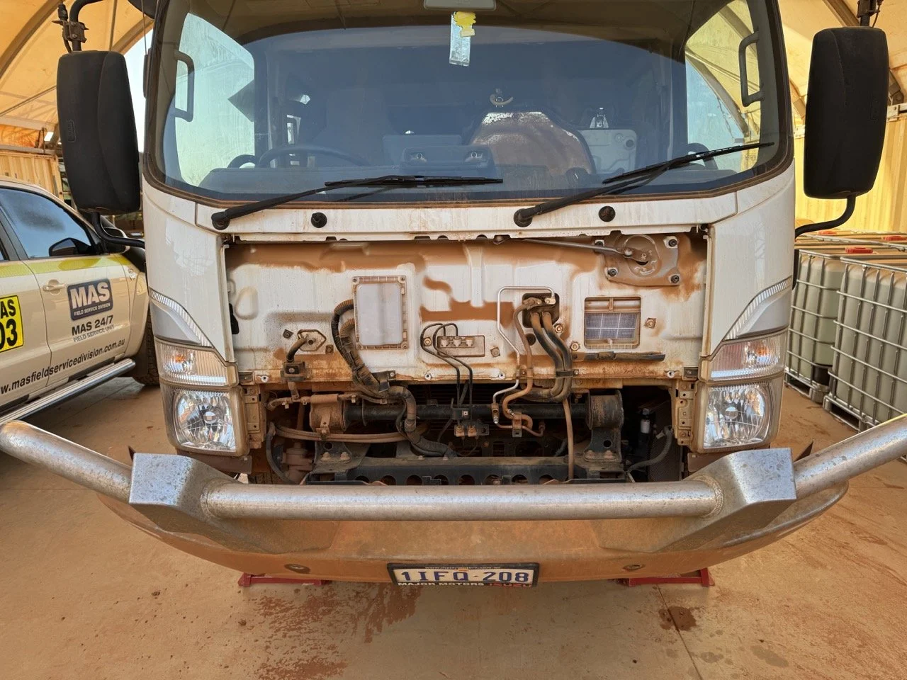 Isuzu NNR 45-150 Truck air con repairs performed on-site at Barrow Island