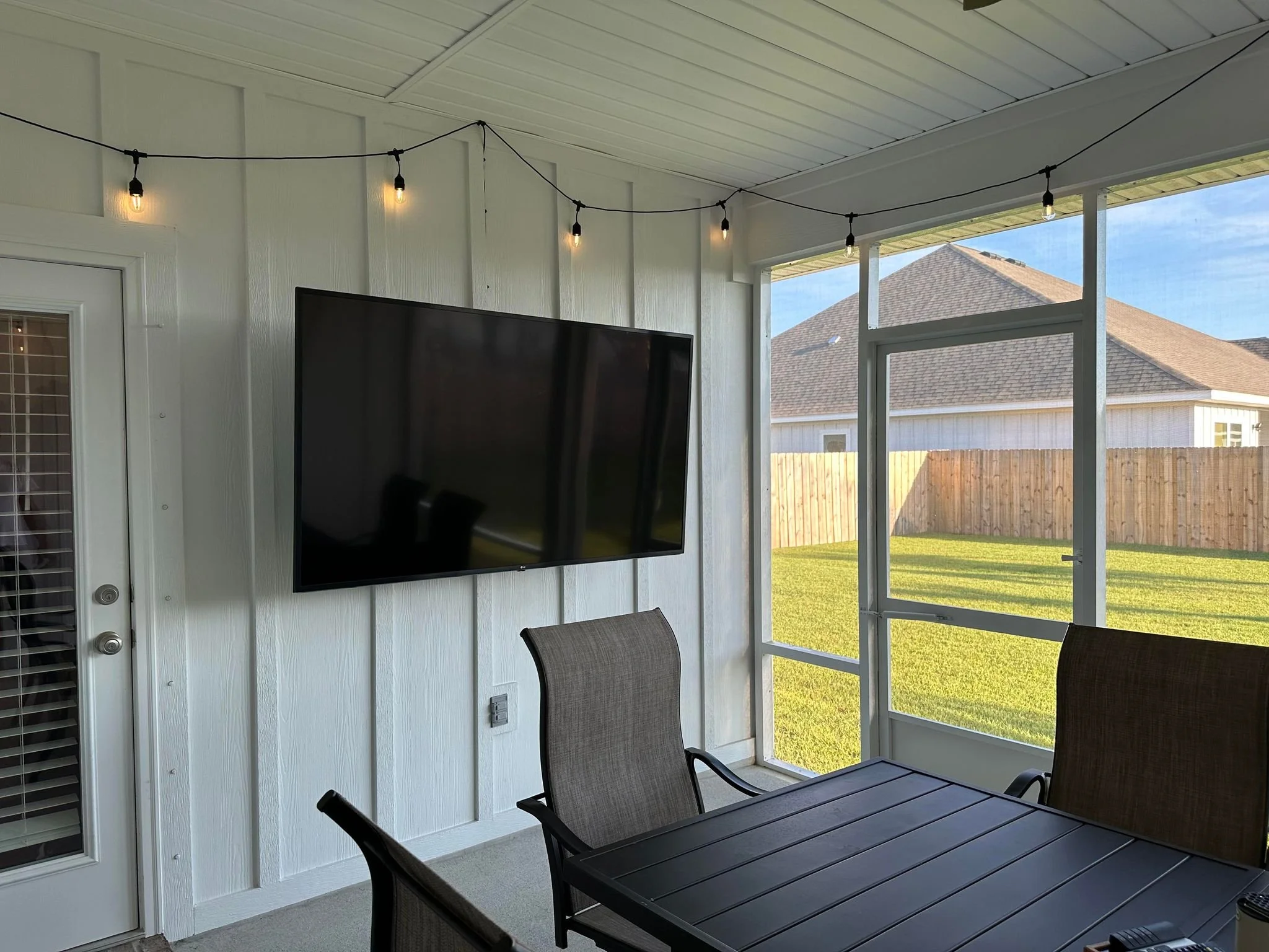 75" TV Mounted to Hardieboard on outside patio