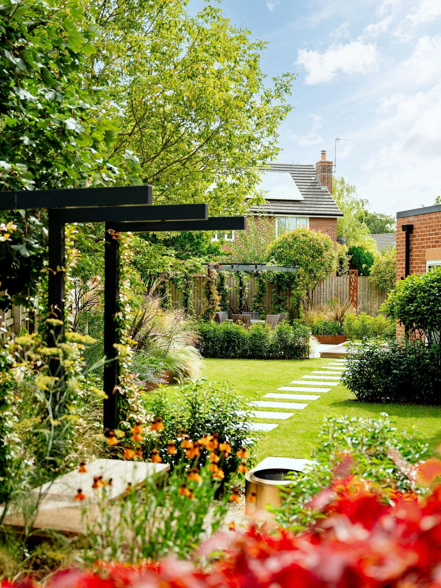 Project Showcase: Whalley 🌿🏡

A few weeks ago, we showed you the transformation of this garden in Whalley - we wanted to replace plain wooden fences and basic lawn with real texture and natural privacy.

Peter added sleek black posts and warm corte