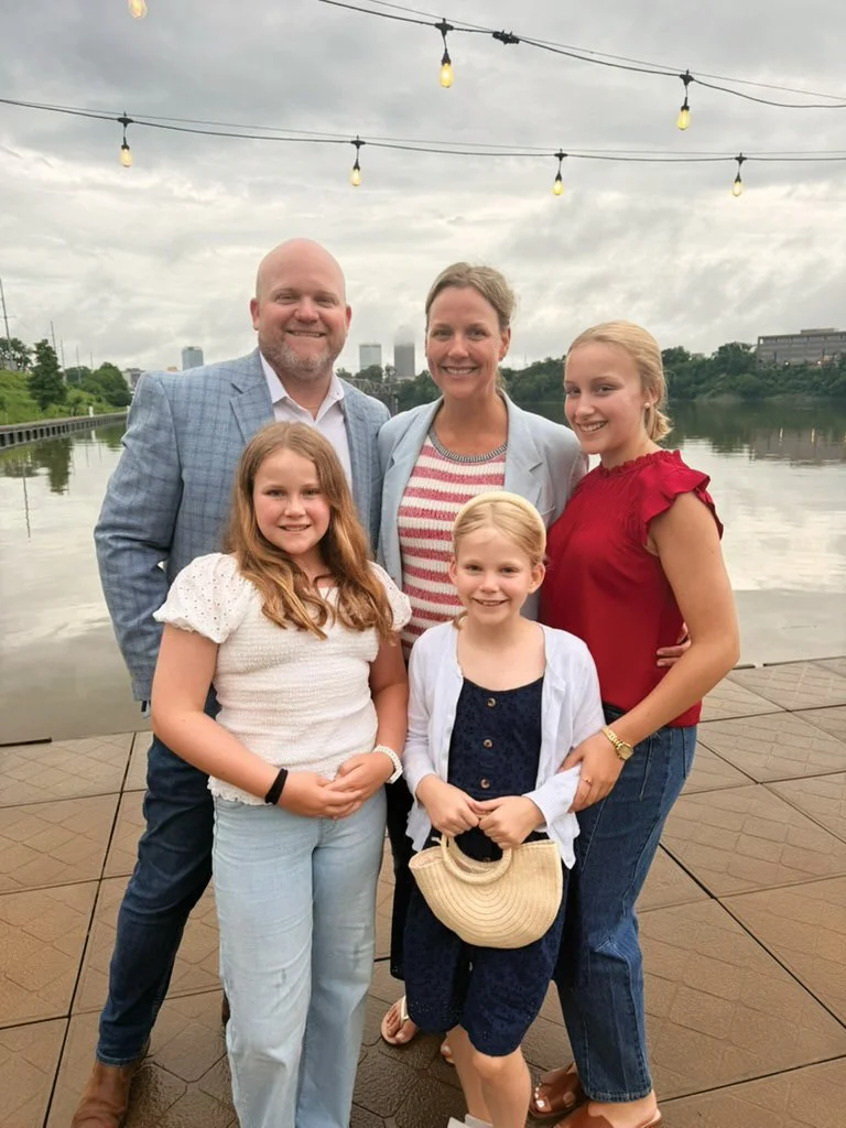 Alex Holladay and family