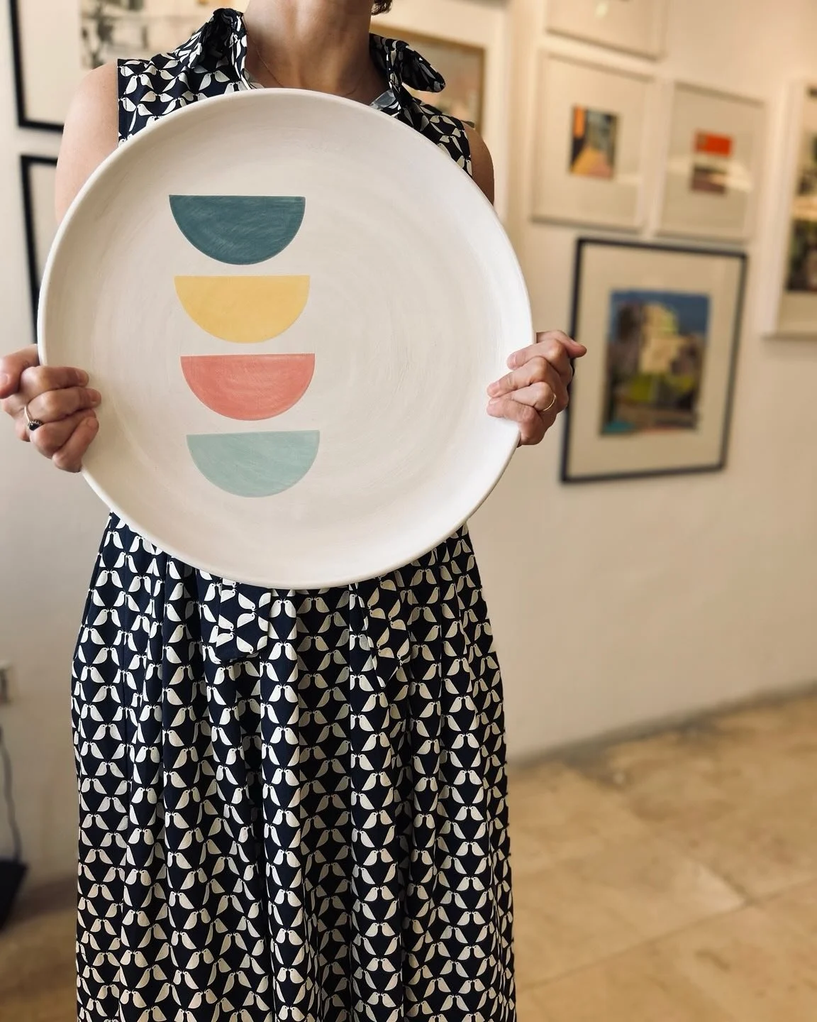 These wheel thrown platters are hand painted and influenced by mid-century design. They can be used for serving sophisticated bites or for styling your space with pops of colour. The biggest is 38cm diameter, medium is 34cm diameter, and the smallest