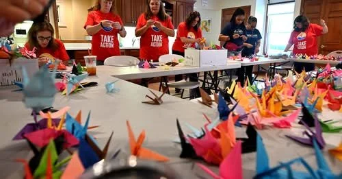 Service with smiles rolls up sleeves on United Way Day of Action