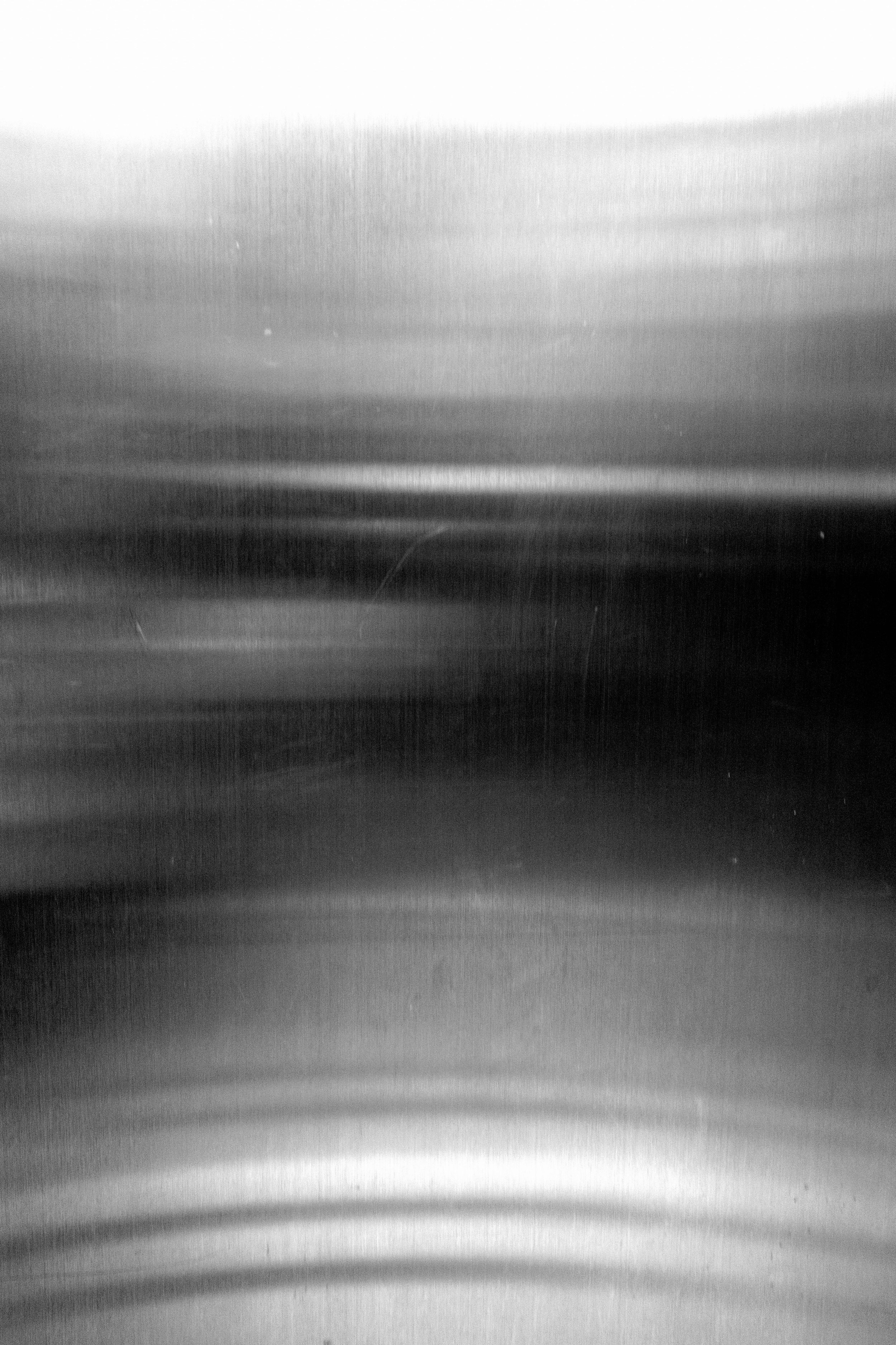 Abstract black and white blurred lines and textures.