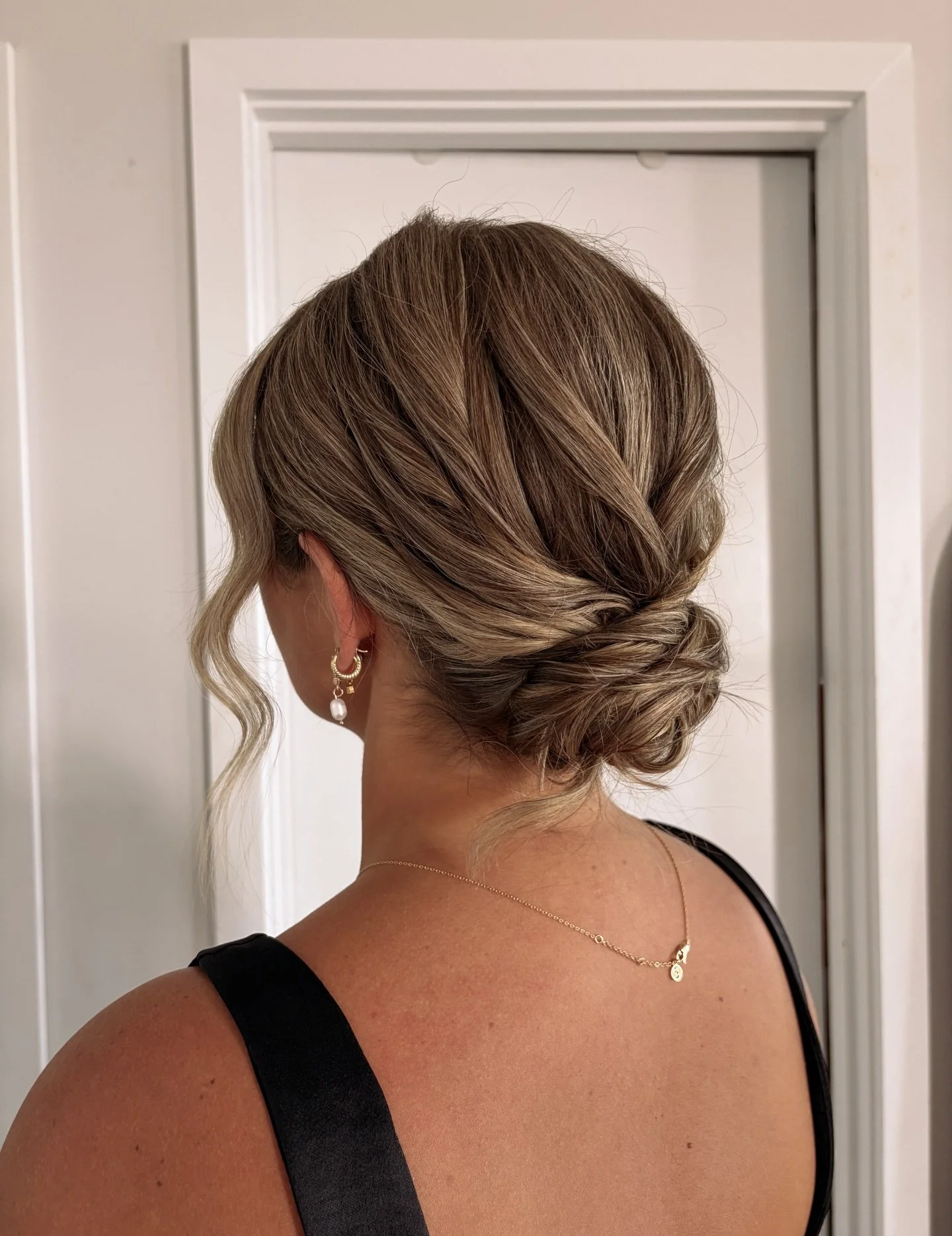 Still not over this textured bun 🤍

This bridesmaids hair was just below shoulder-length. Soft volume, movement and holds beautifully throughout the day through the wind, photos and the d-floor without needing extra length.