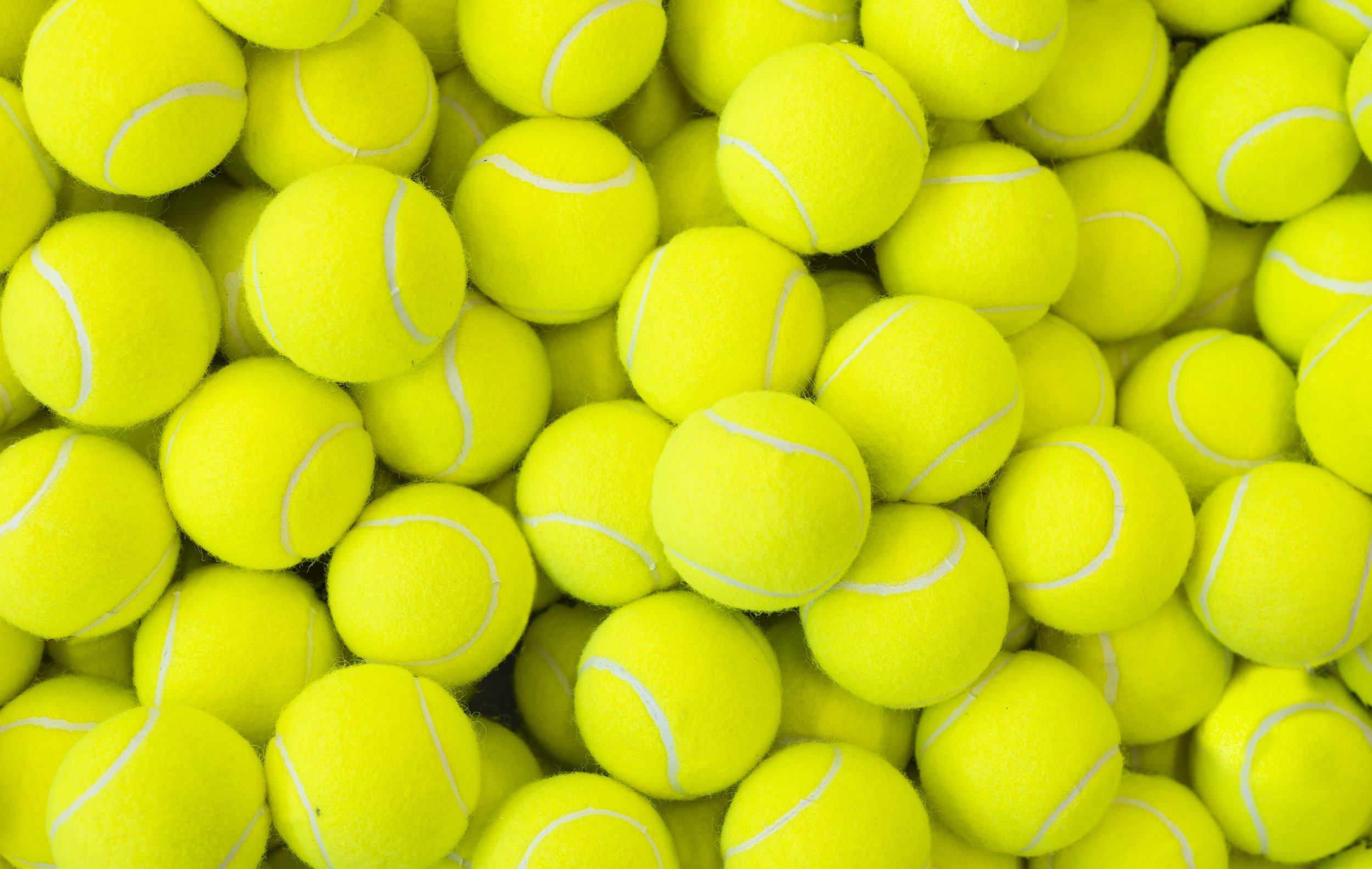Large-Stack-Of-Tennis-Balls-Wallpaper-Mural.jpg