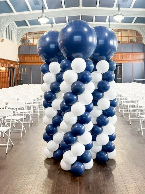 Classic balloon columns with spiral design for event setup in Metro Detroit