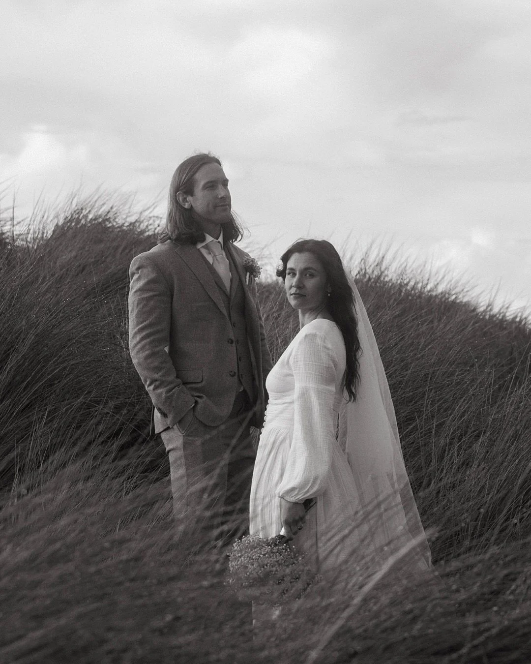 A selection of favourites from a beautiful, blustery, joyful day for Freya & Craig and their deeply moving intimate wedding in Bamburgh 🕊️