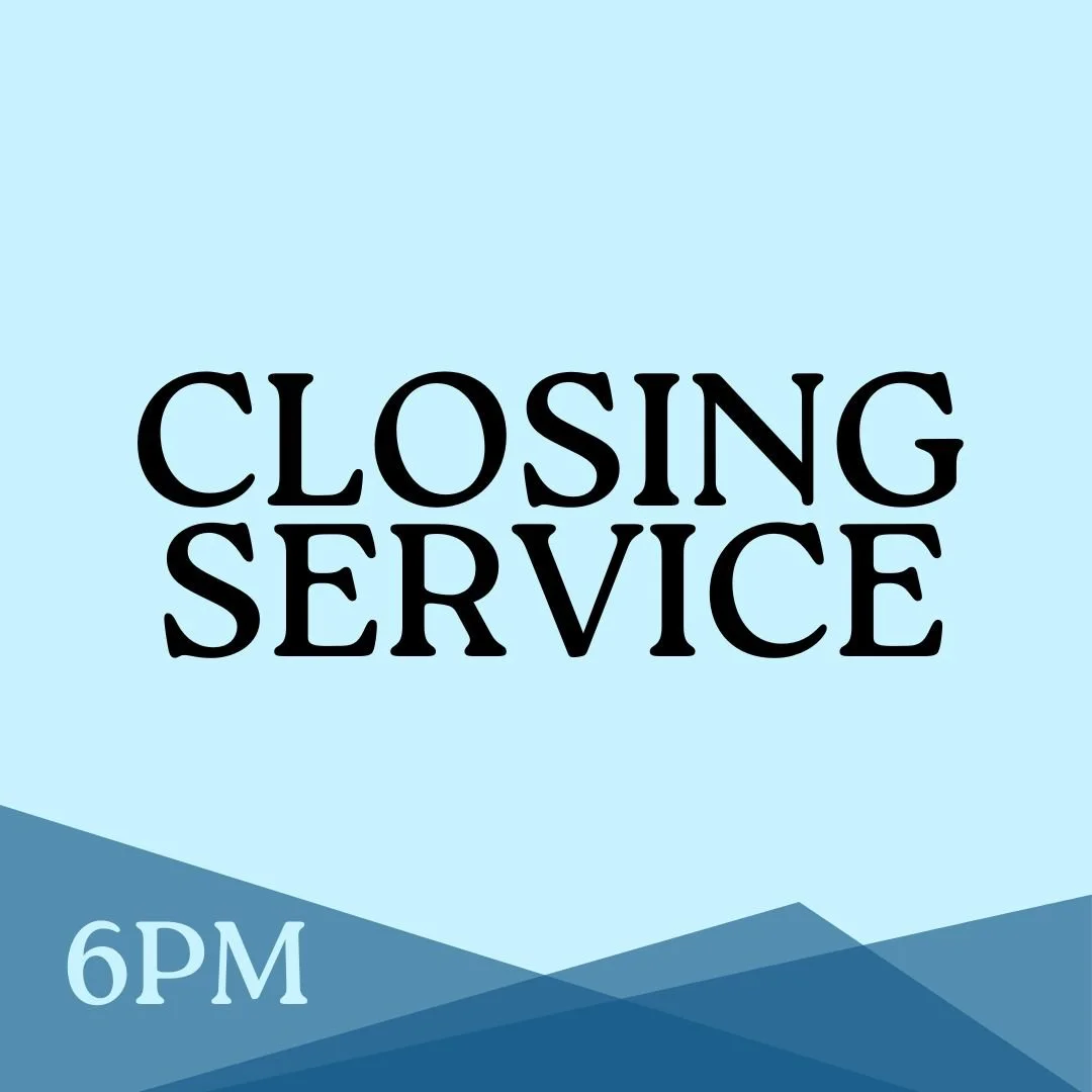 An open Bible with a red sun, a white cross inside the sun, and golden rays emanating from it