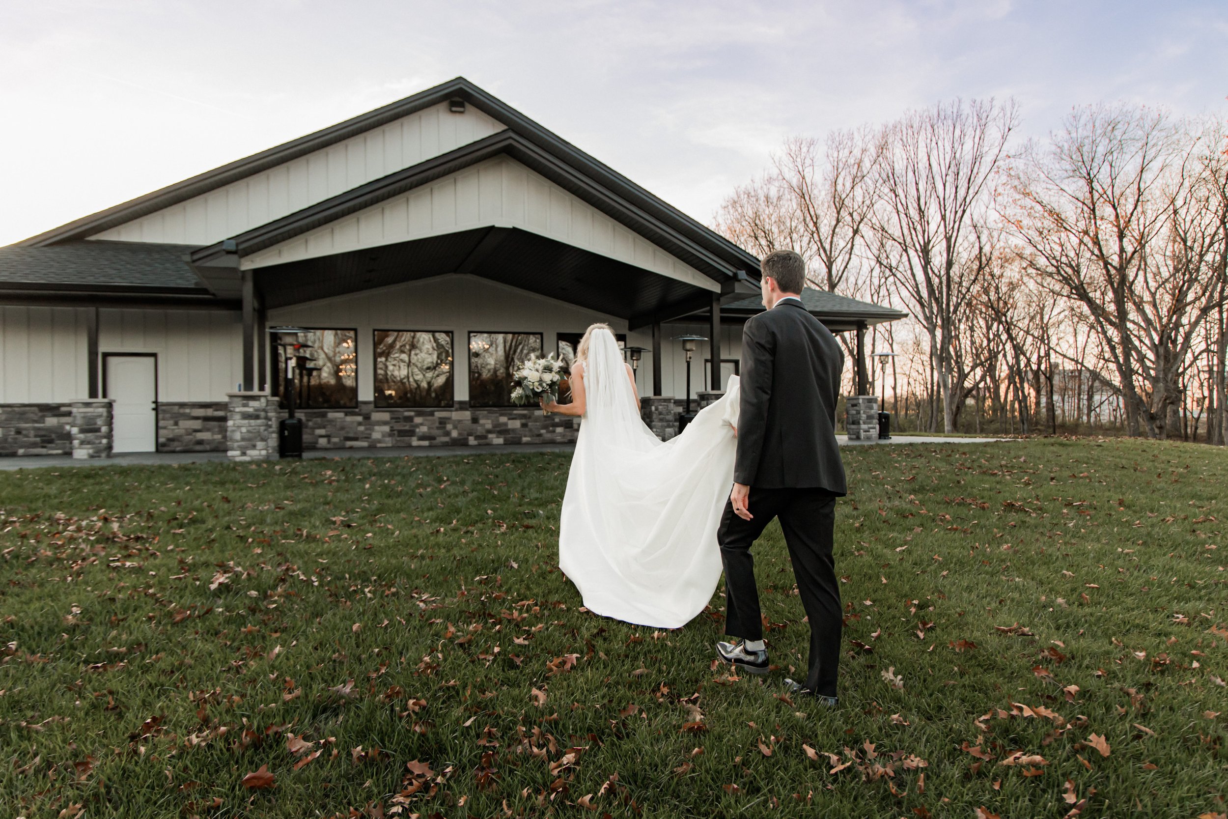 1 Groom holding dress.jpg