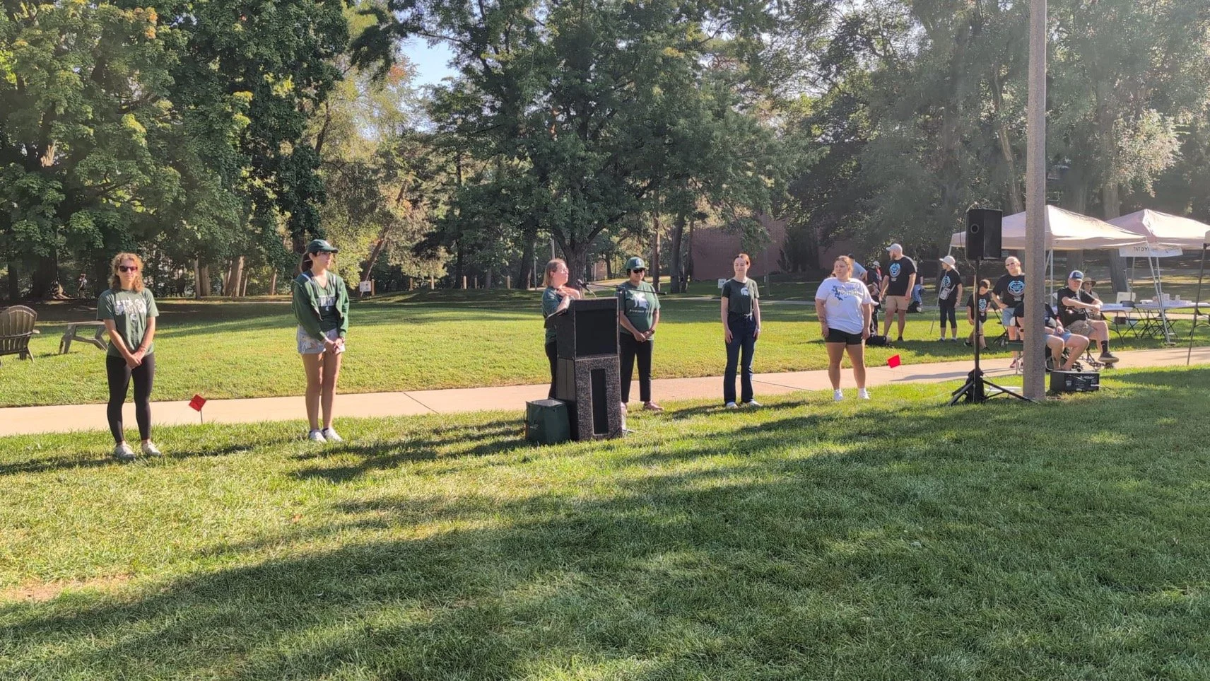 Leading vocal exercises at the MI Parkinson Foundation Hero Walk, 2024
