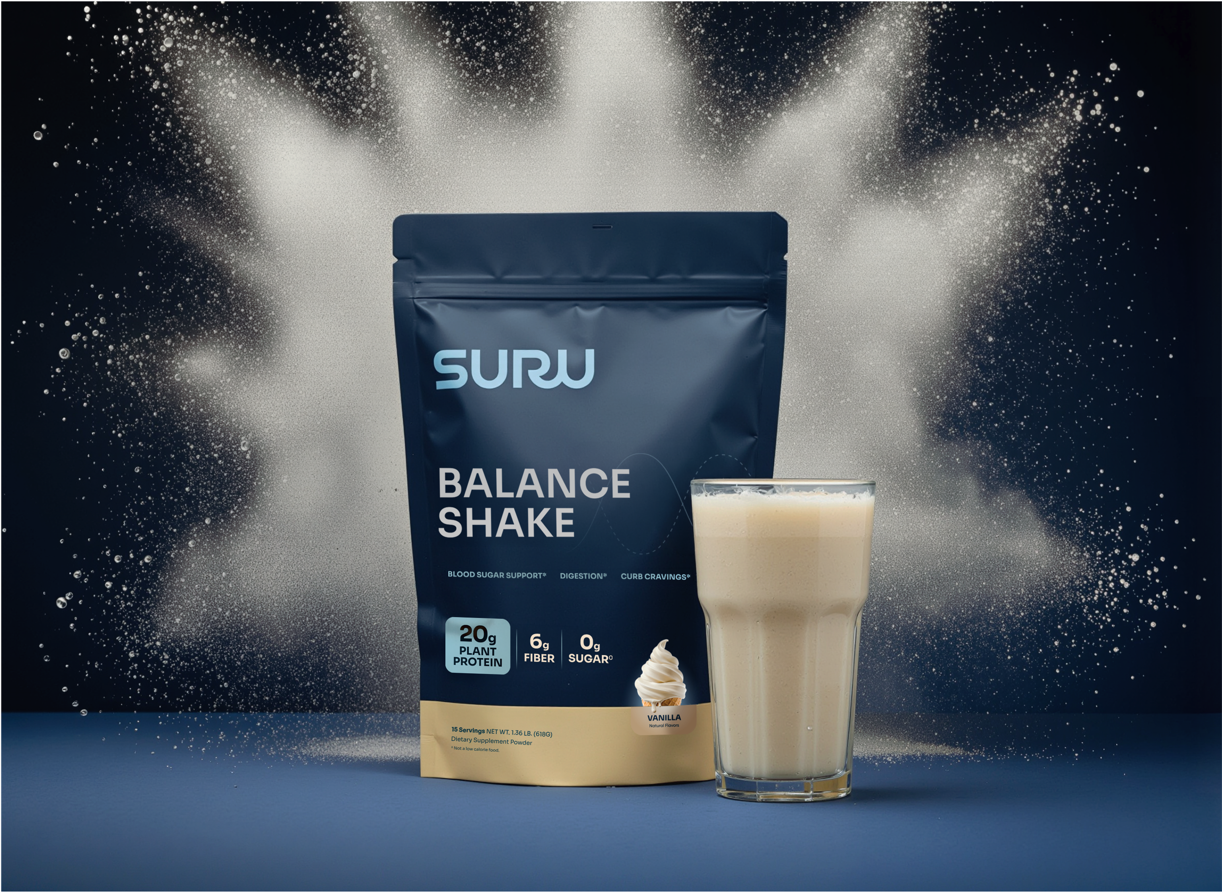 A packet of SURU Balance Shake Vanilla flavor with information about its benefits, including high protein, fiber, and zero sugar, placed next to a glass of creamy vanilla liquid and a dollop of whipped cream on a dark background with splattered white powder