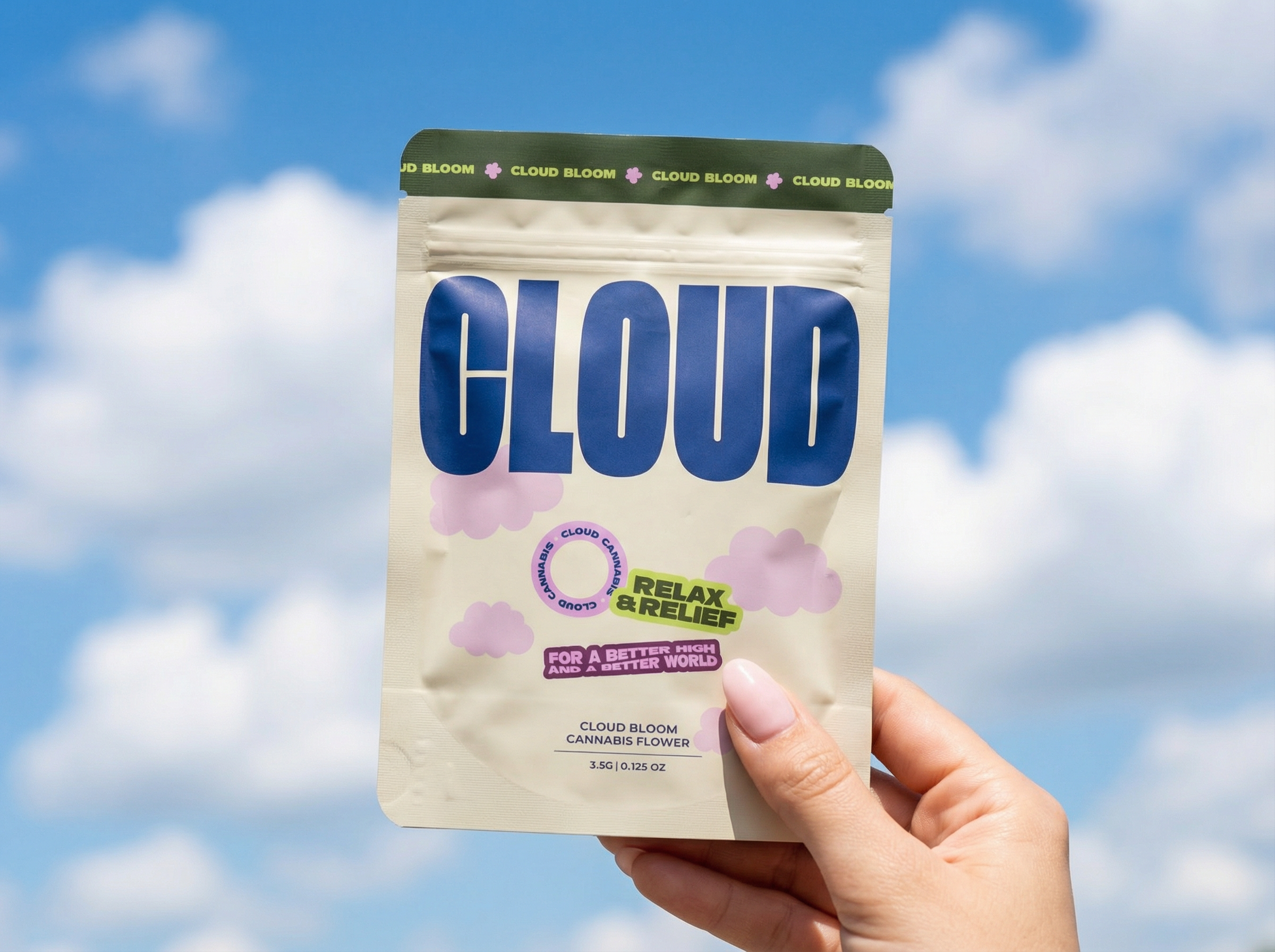 A person holding a bag of cannabis flower labeled 'Cloud Bloom' against a blue sky with white clouds.