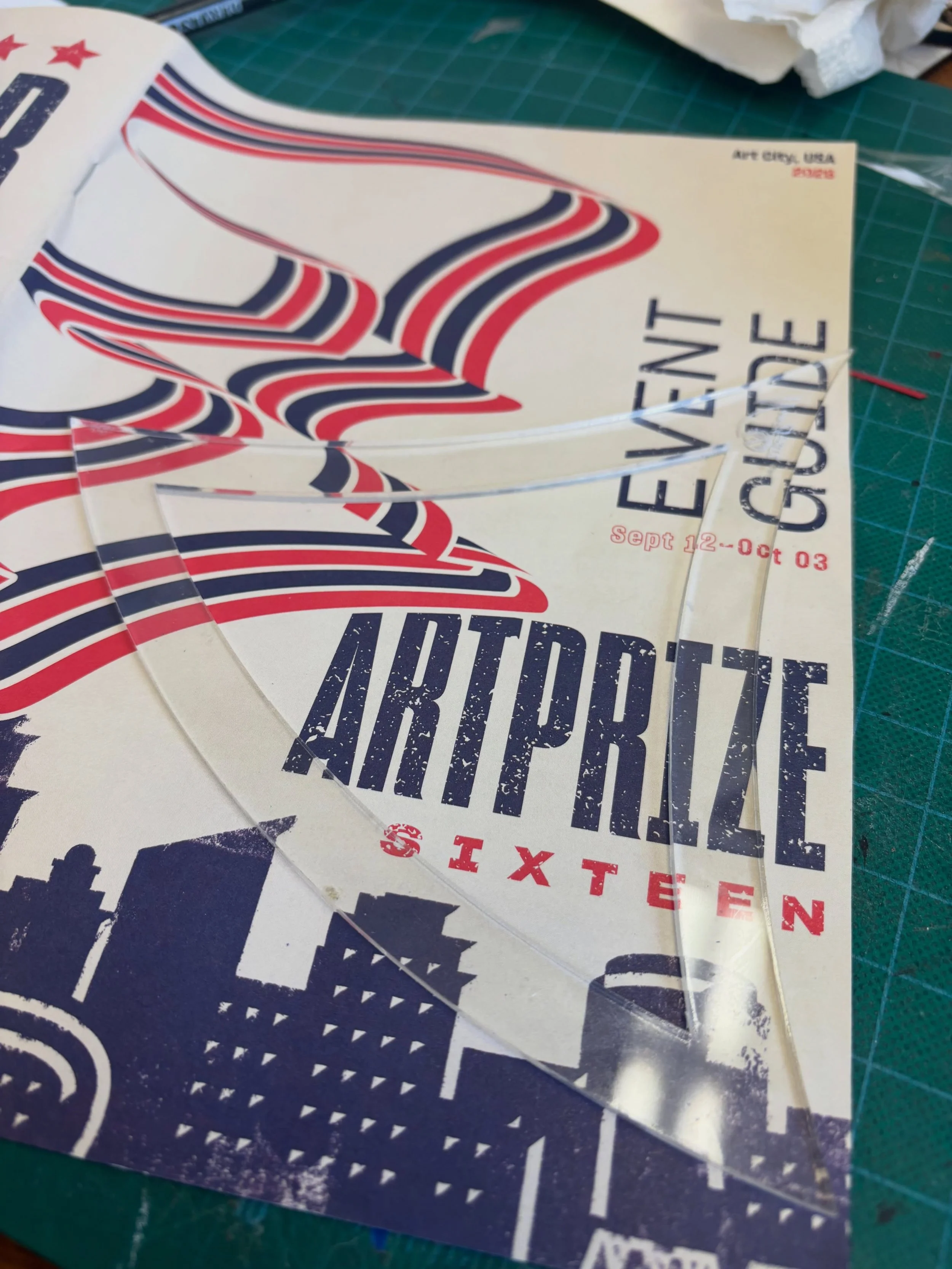 This is the @artprize event guide, cut into petals and shapes. You can still see Monroe Community Church on that one, listed as stop number 9, the map that led so many of you to the panels. Now it&rsquo;s becoming part of the panels.

That&rsquo;s ho