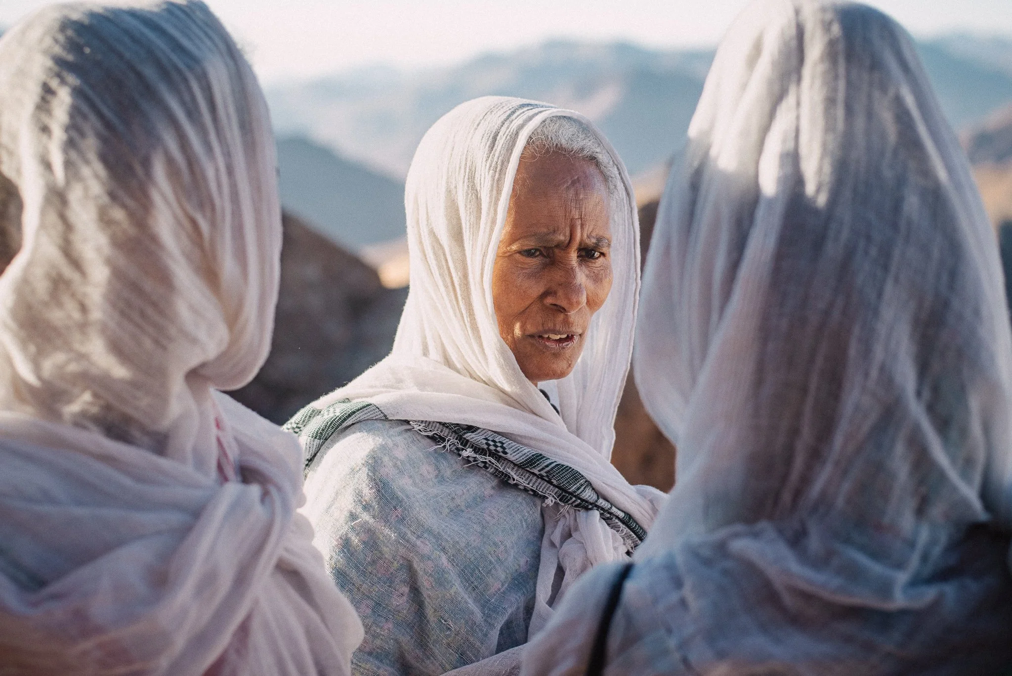 An older Ethiopian lady with two younger women. Older generations also ventured for the exhausting climb.