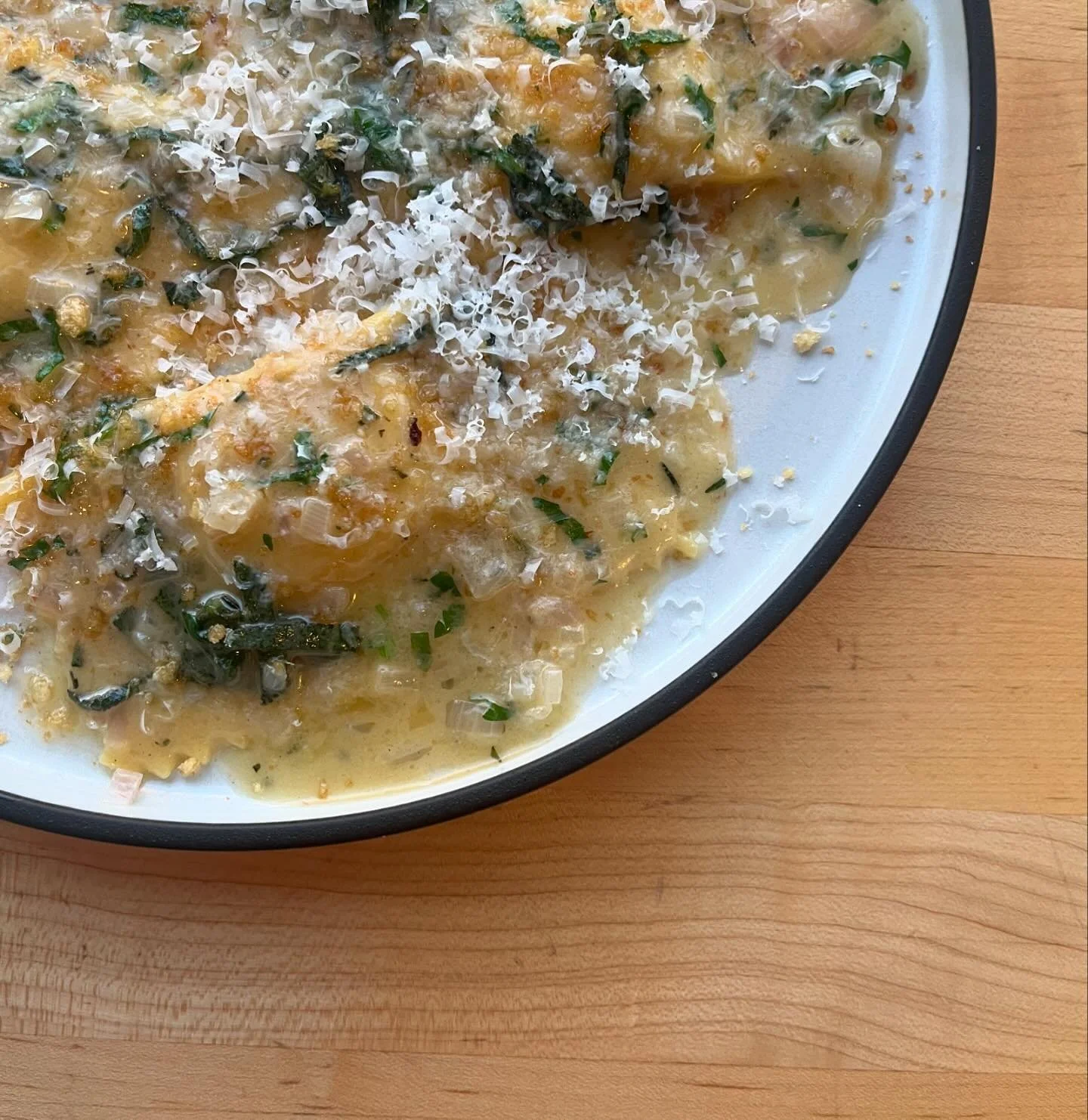 Butternut squash ravioli, spicy breadcrumbs, braised leeks, aged goat cheese.  Photo: @johnny.rigatoni