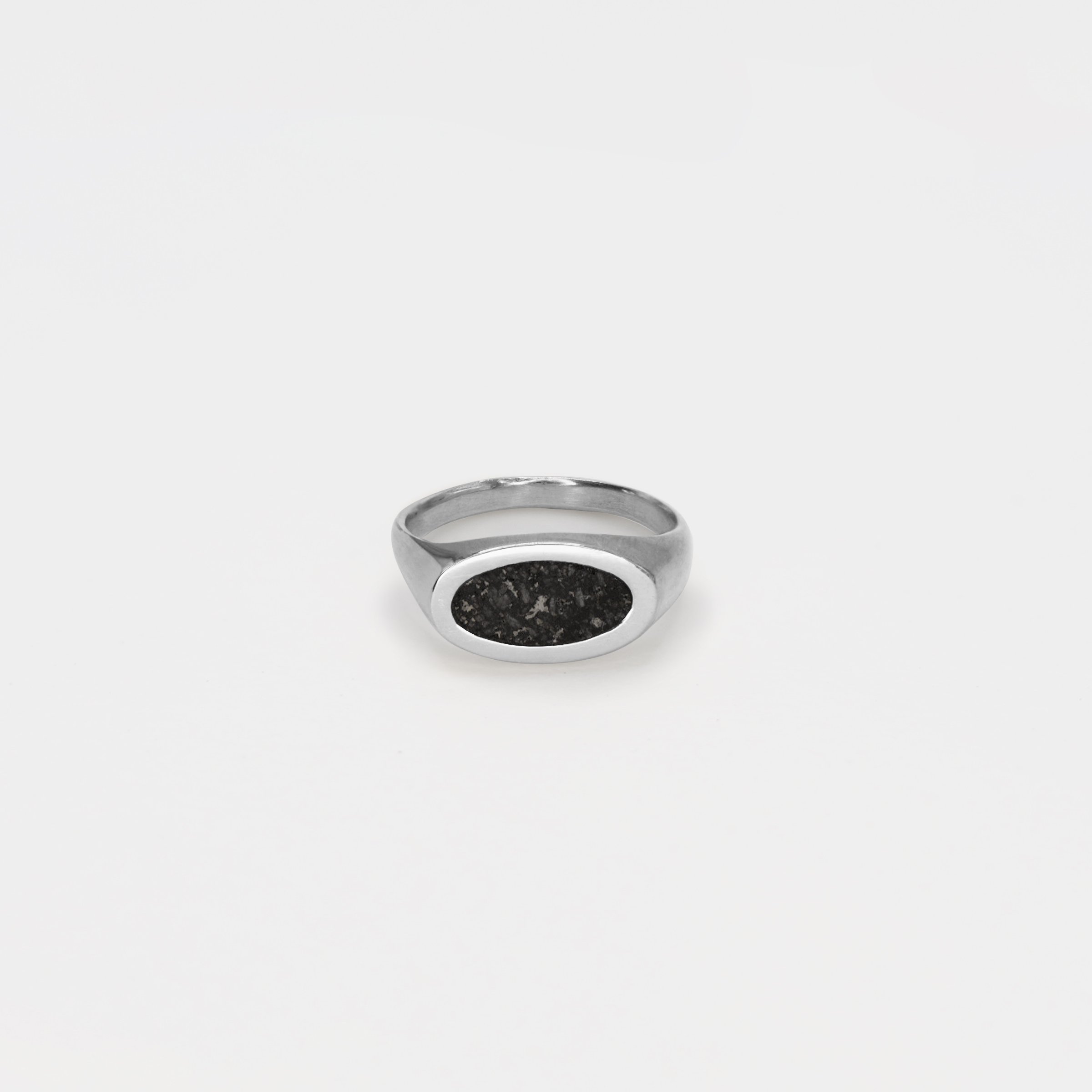 The Small Pedestal Ring Silver Volcanic Rock.jpg