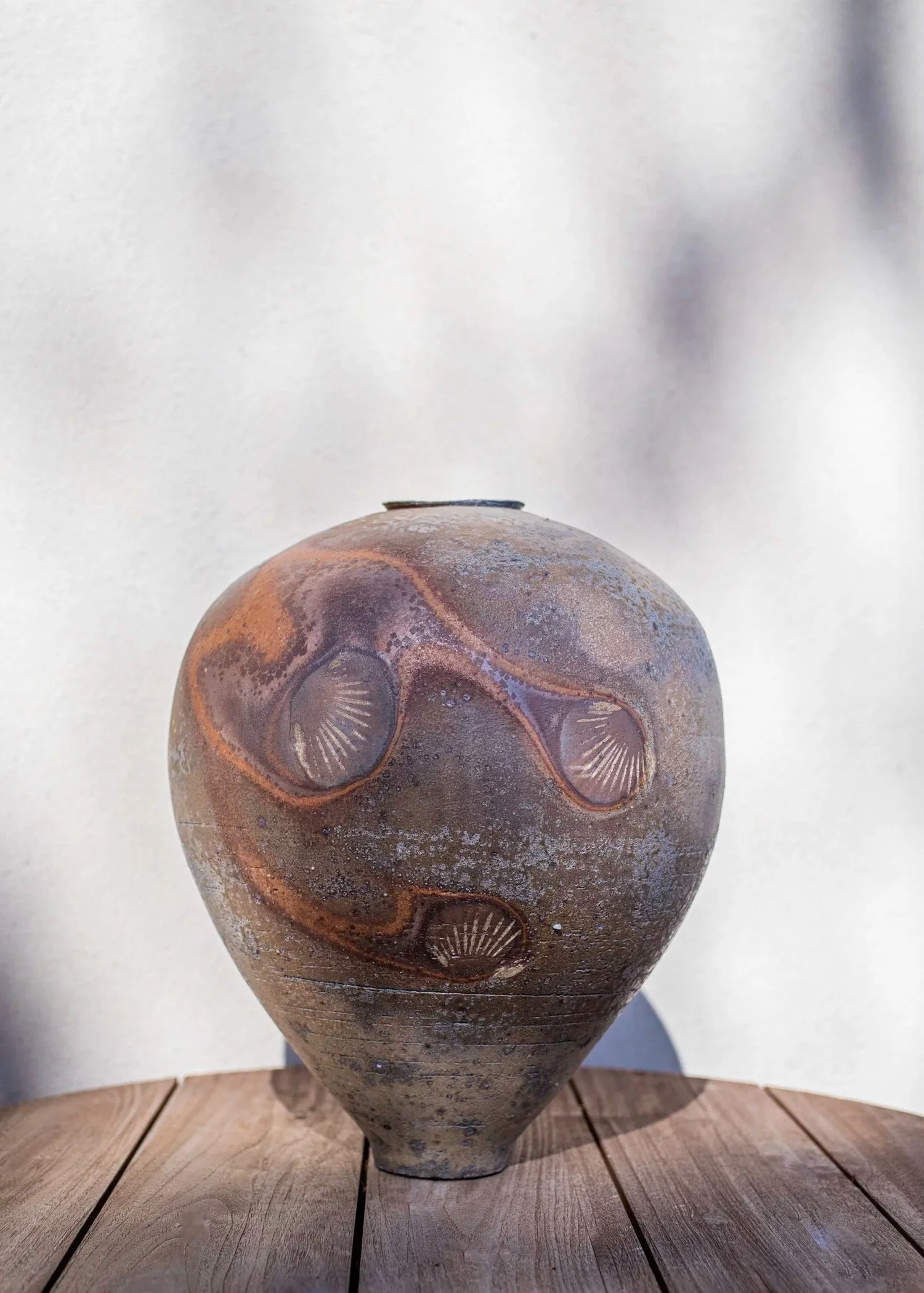 LOGAN WANNAMAKER  
Moon Jar (2025)  
14” x 14” x 18”  
Stoneware with New Zealand seashells and native clay slip  
$3,600