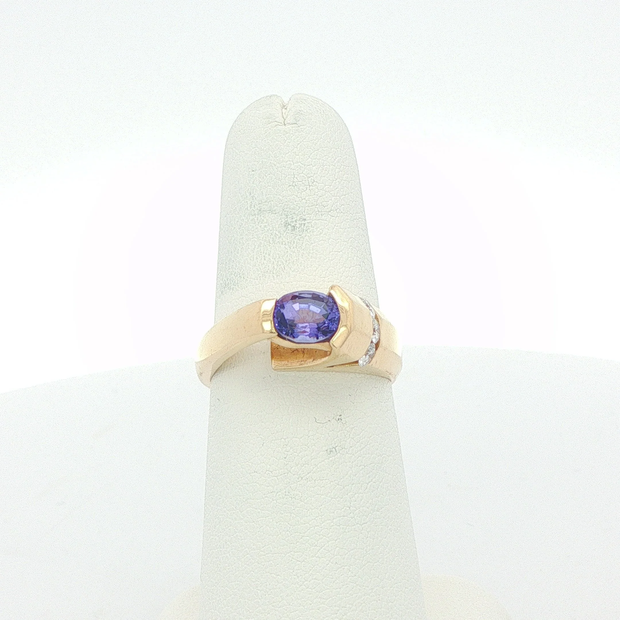 Elevated Tension Set Tanzanite & Diamond Ring