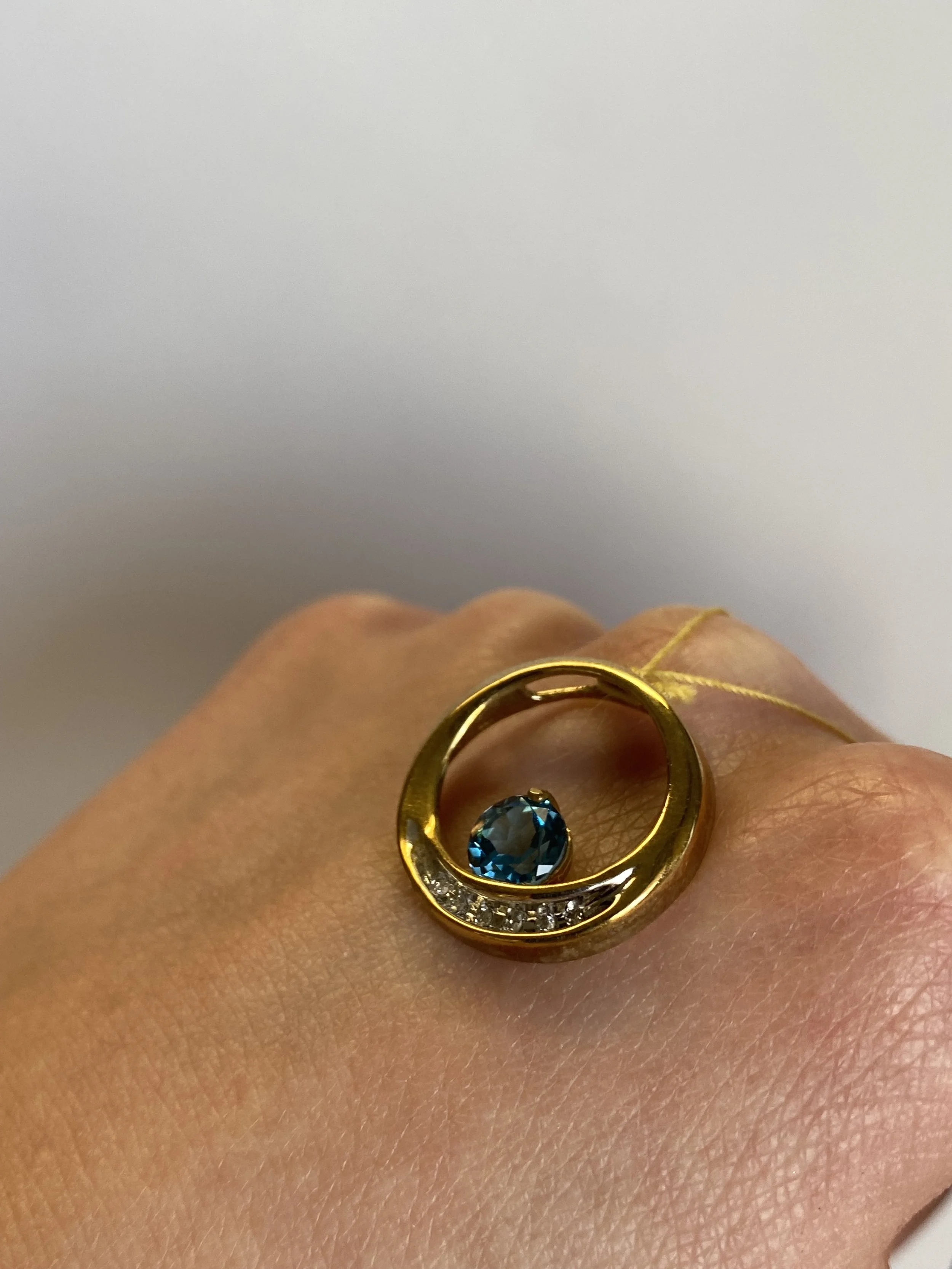 10k Yellow Gold Blue Topaz & Diamond Circle Pendant