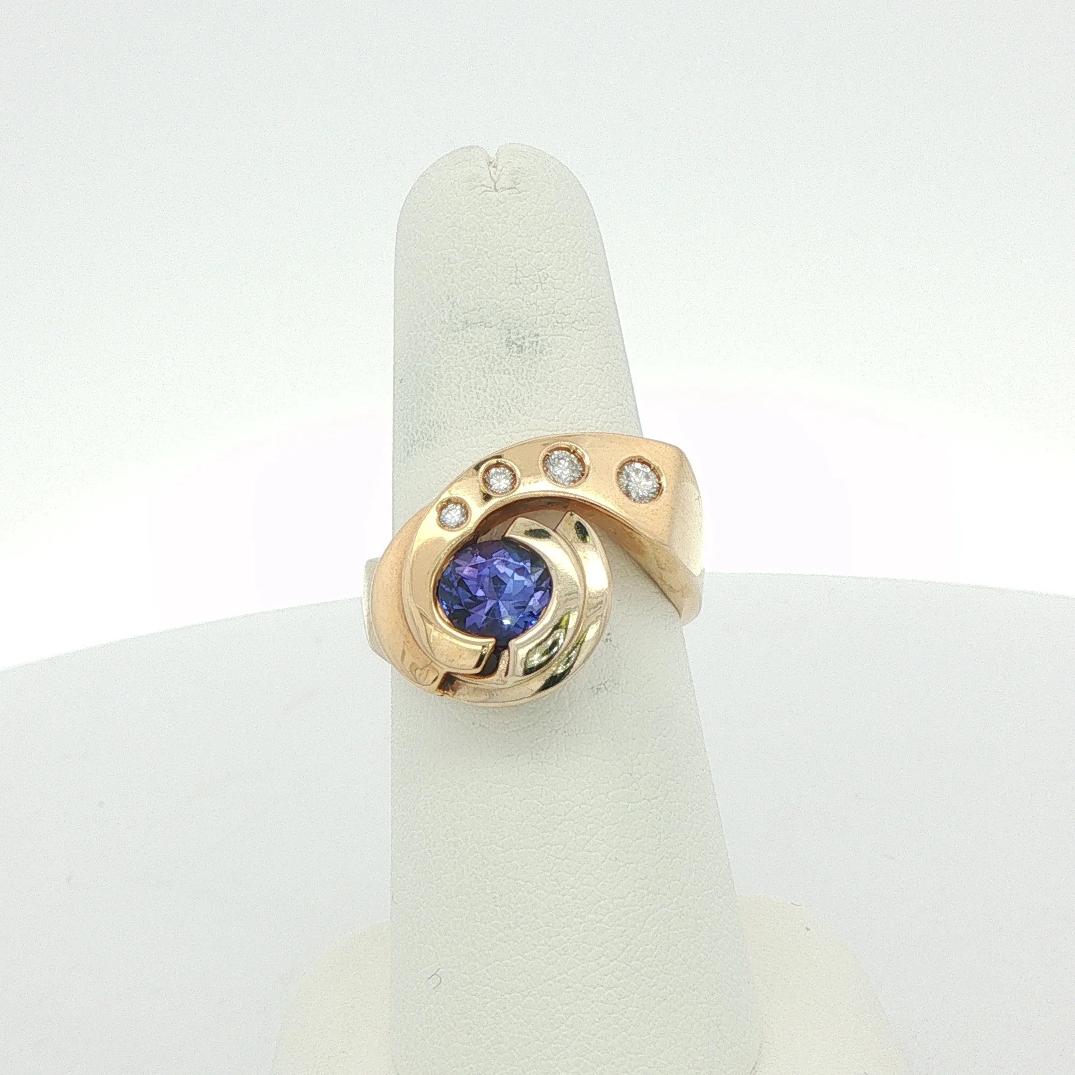 Two-Tone Diamond & Tanzanite Swirl Ring