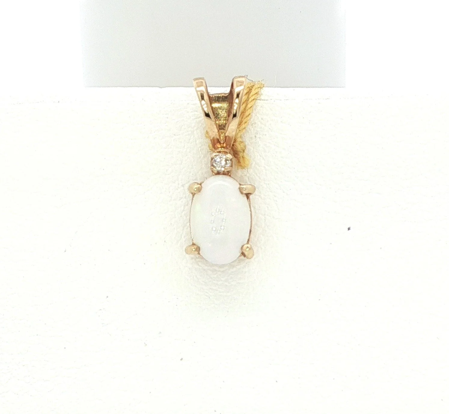 14k Yellow Gold Opal Pendant With Diamond Accent