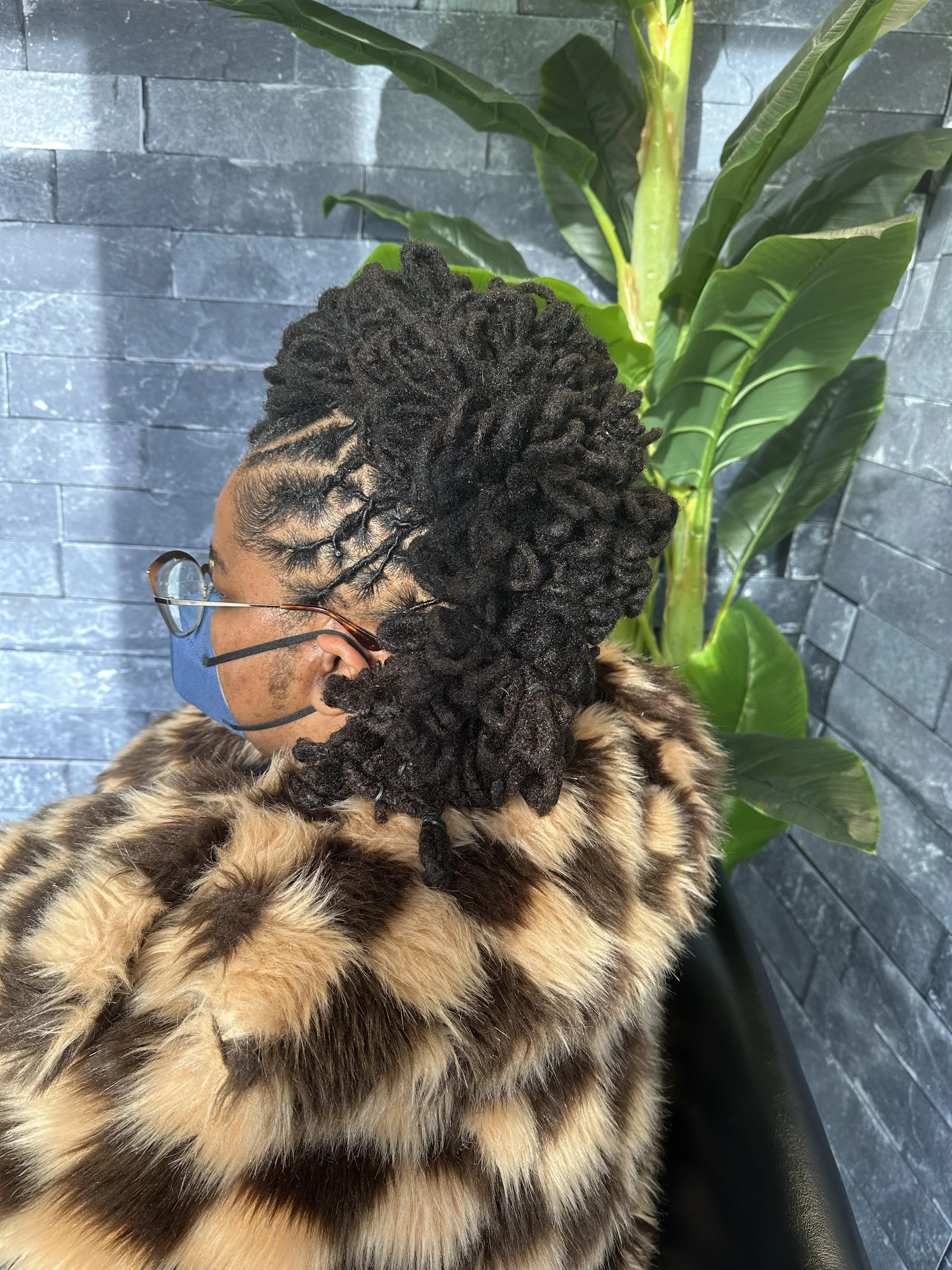 Starter Locs 101: A Beginner’s Guide to Mastering the Journey at Our Seattle Curly Hair Salon
