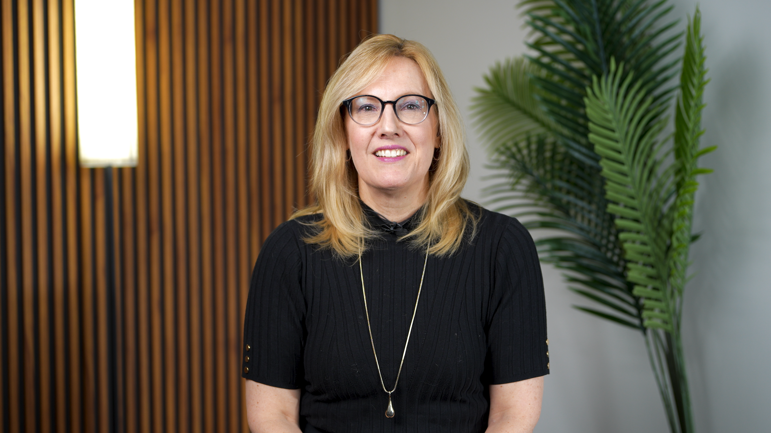 Business owner getting ready to make video content reels that highlight her expertise.