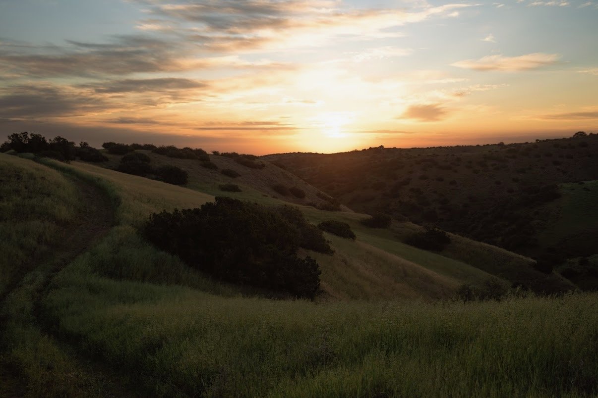 Sunset over rolling hills at Carissa Plains Outfitters, closing out a day in California’s Central Coast hunting country
