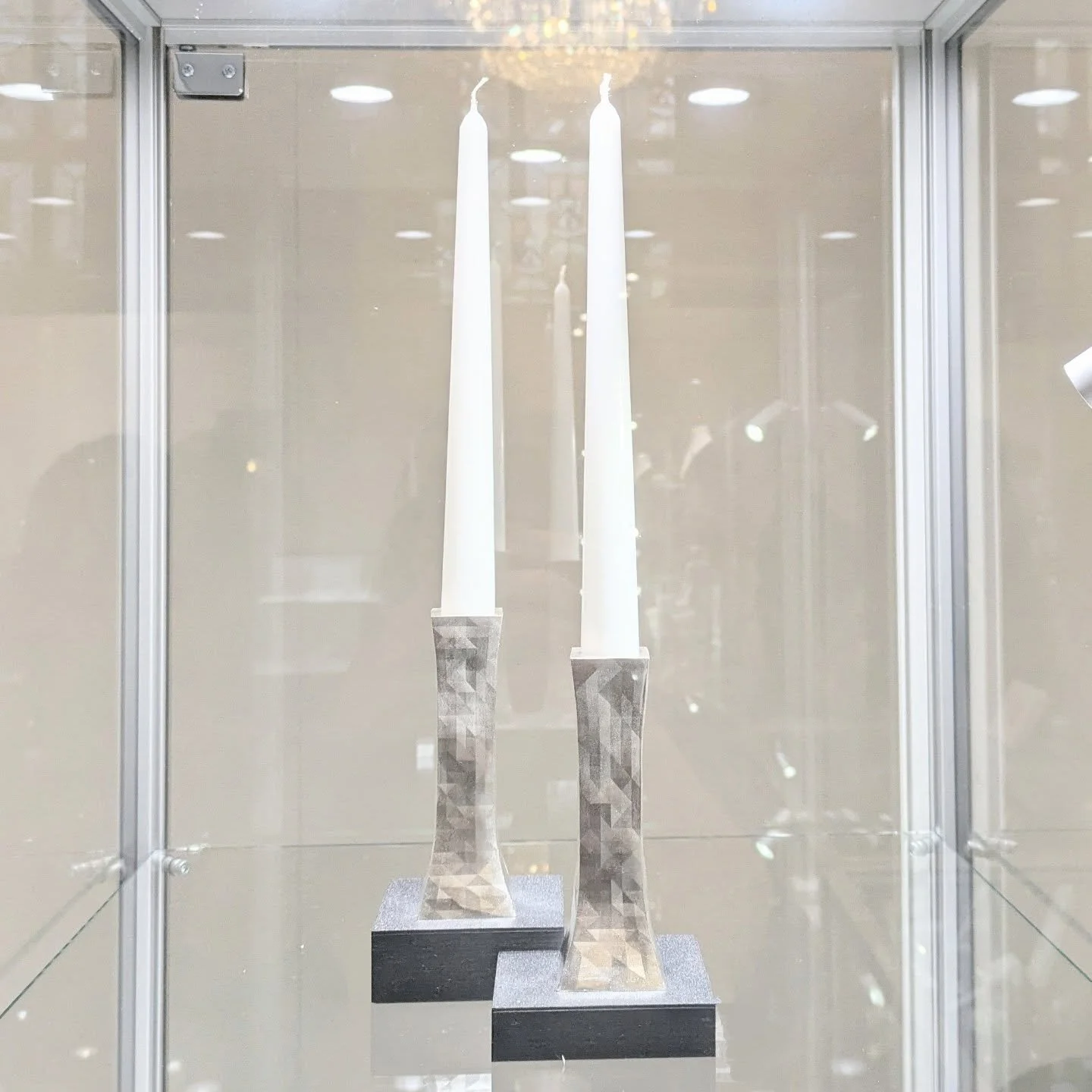 ✨Today is the first day of @goldsmithsfair week one! I'll be on stand 36 all week showing my collection of jewellery and silverware. Including these silver faceted candlesticks, the newest pieces I've been working on. 

Week one 23-28th sept 

#golds