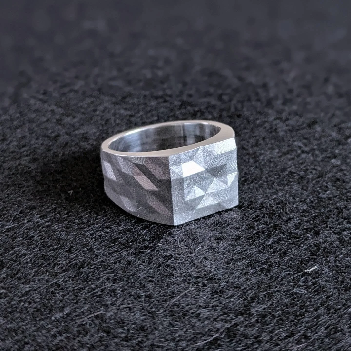 New faceted rings ready to show @goldsmithsfair week one. Getting the final pieces made before I head to London in a couple of weeks!

Week one 22-27th September 
Goldsmiths' Hall, London

#geometricjewellery #silversignetring #contemporarysilverjewe