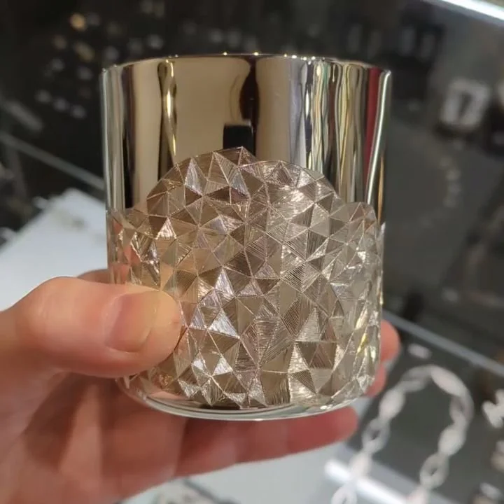 The bright lights of @goldsmithsfair highlight the faceted engraved surface of the beakers. 

The intention with the design of this beaker is to play with reflection of light creating the illusion of a 3D form on a 2D surface.

A few days left to vis