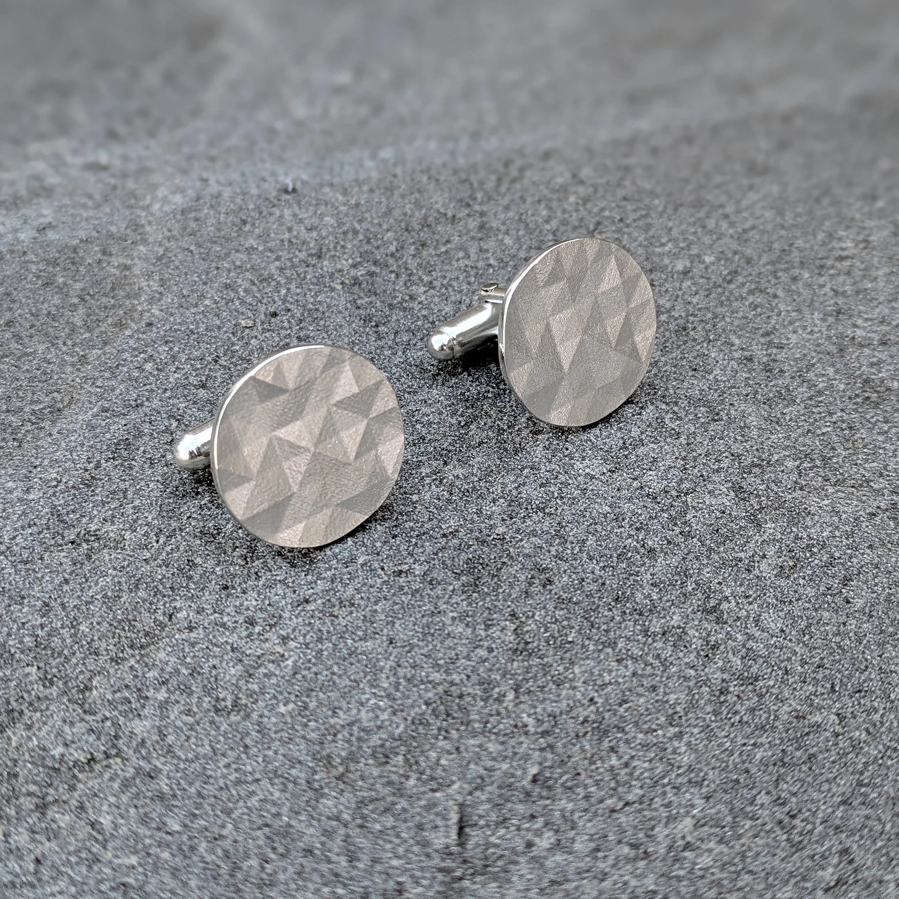 Kathryn Hinton_faceted round cufflink2026.jpg