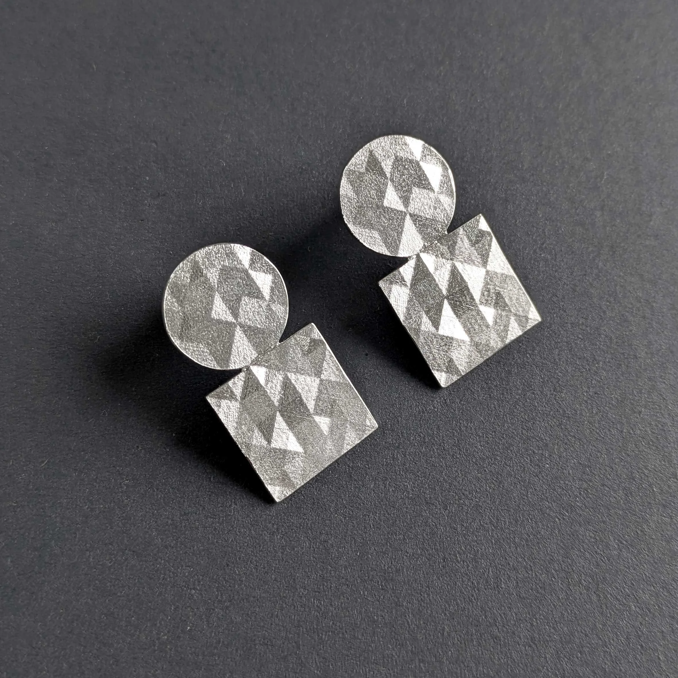 Kathryn-Hinton_circle-and-square-silver-earrings.jpg