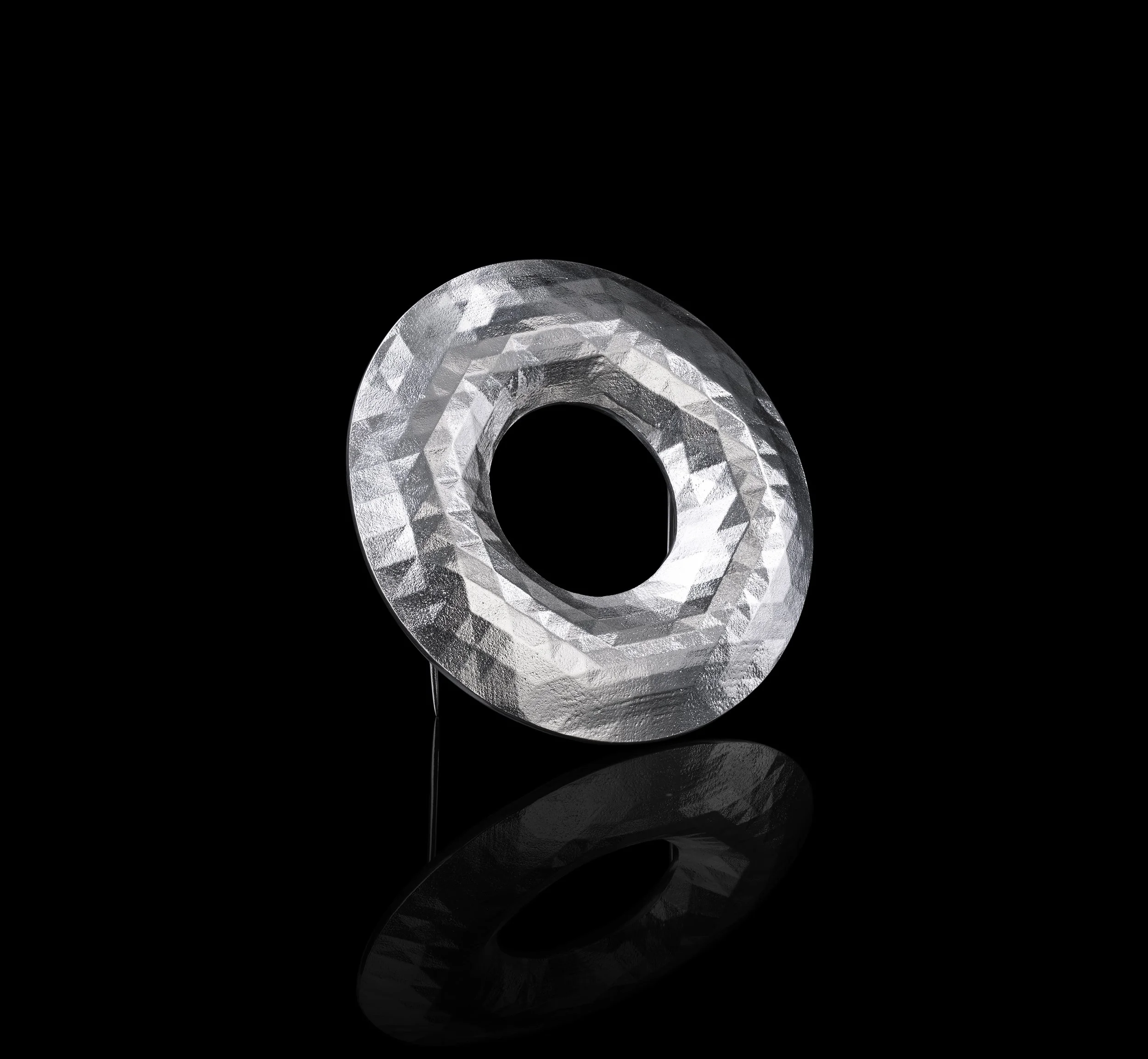 Kathryn Hinton_Faceted Torus Brooch_sterling silver.jpg