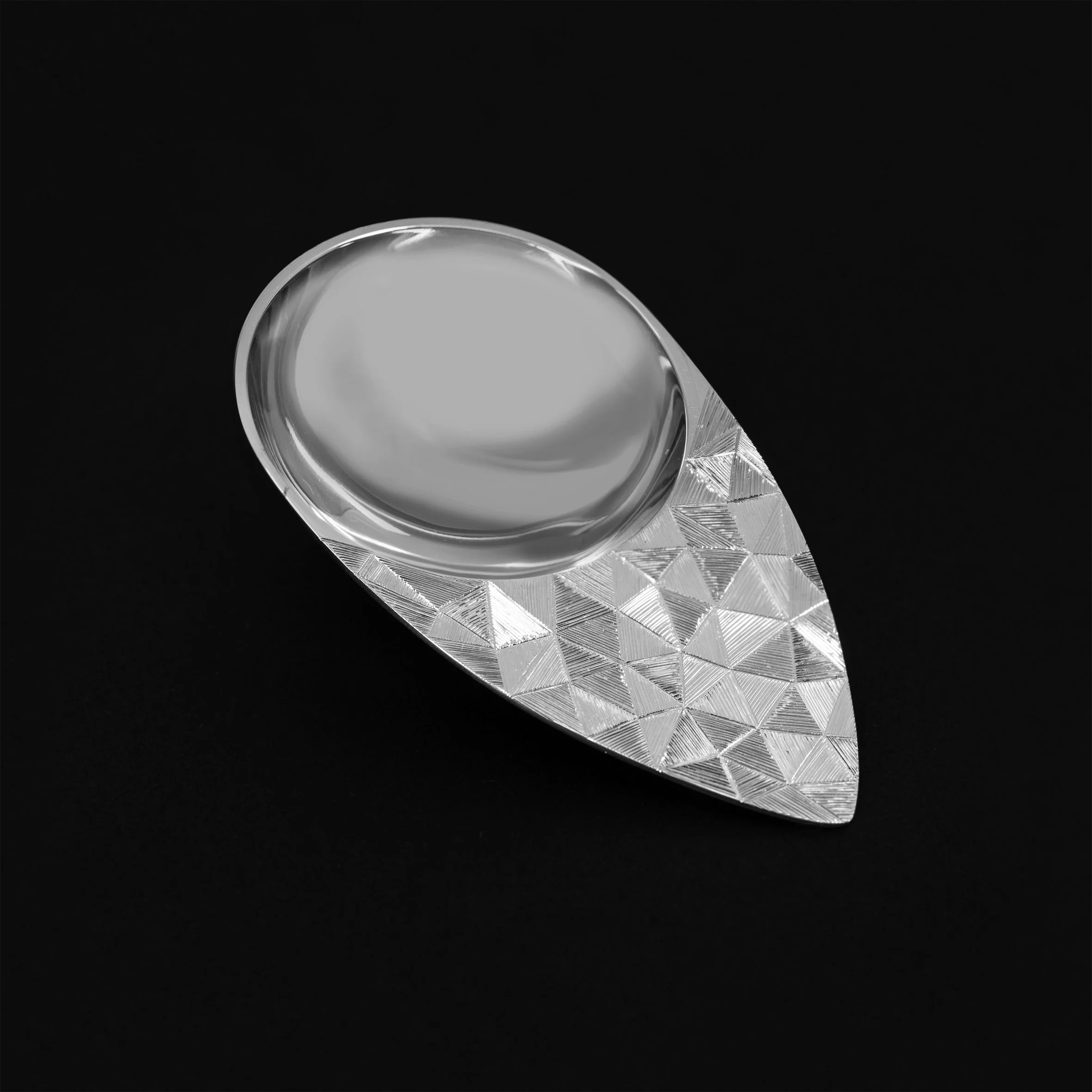 KHinton_leaf shaped scoop with geometric engraved pattern.jpg