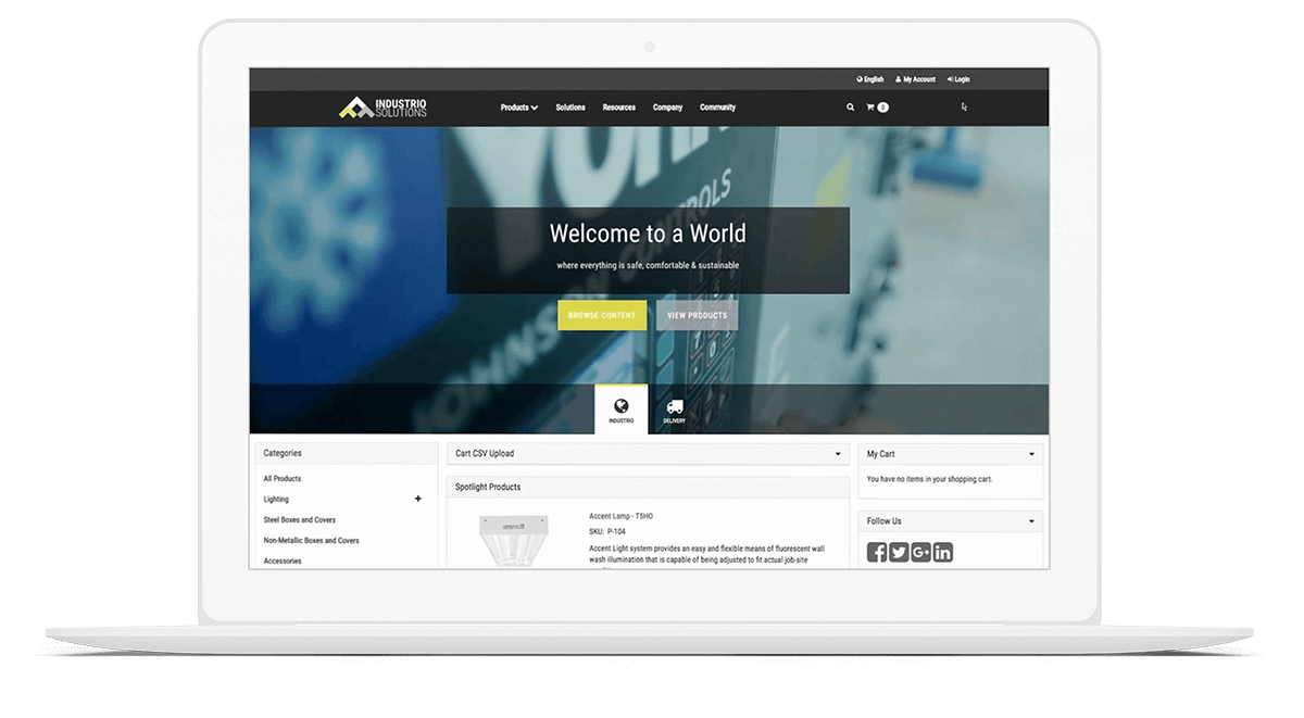 Laptop screen displaying a website for Industria Solutions, featuring product categories and a welcome message.