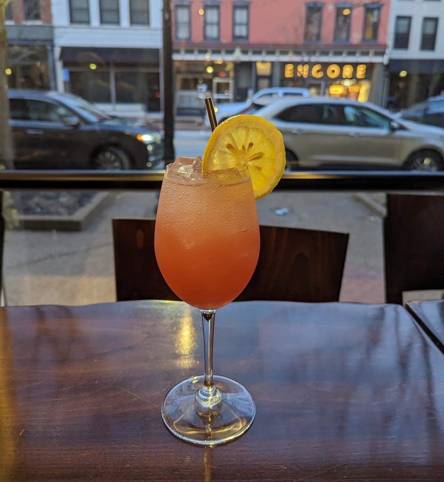 The &ldquo;First Bloom&rdquo;, a refreshing gin lemonade bursting with raspberry and florals! Come support @nokidhungry with our April Drink of the Month!